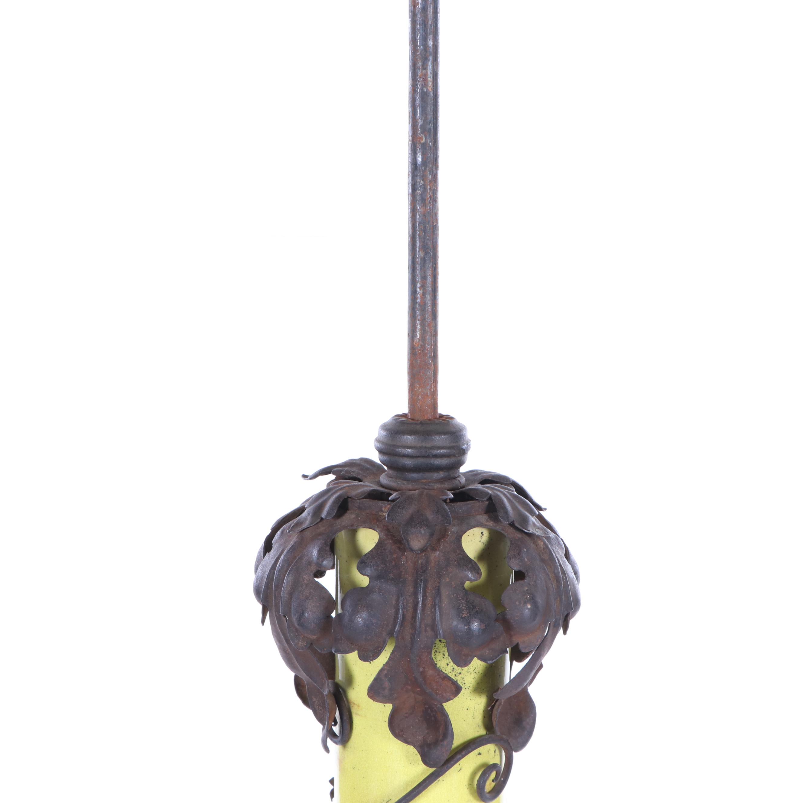 Oversized Yellow Glazed Vase Mounted in Scrolled Wrought Iron Work