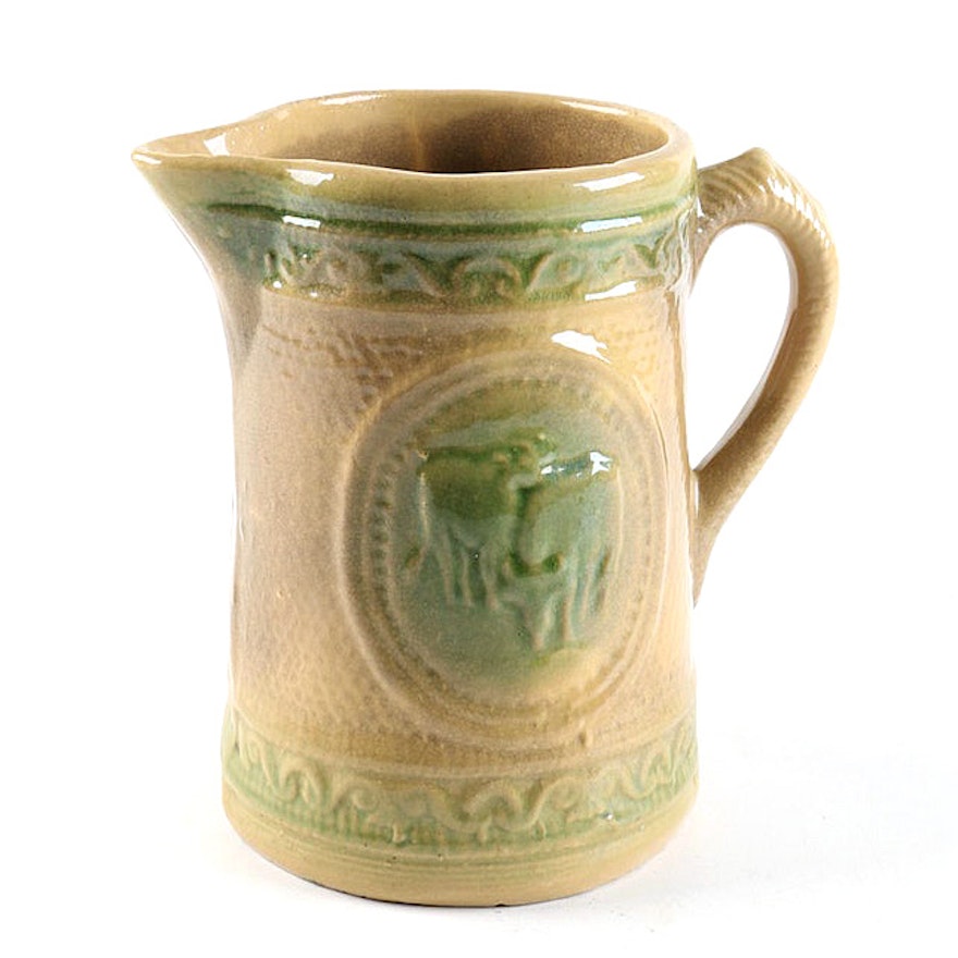 Antique Yellow Ware Pitcher with Grazing Cows