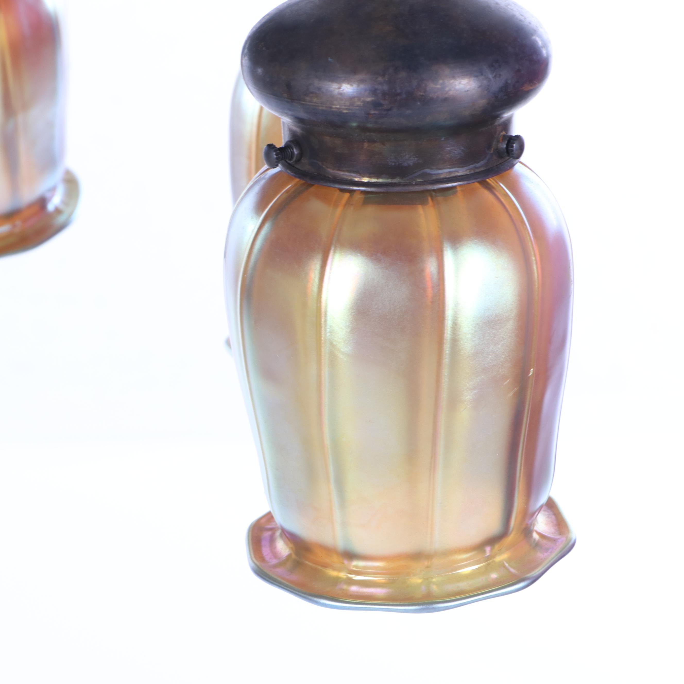 Iridescent Glass Shades Attributed to Quezal together with a Bronze Chandelier