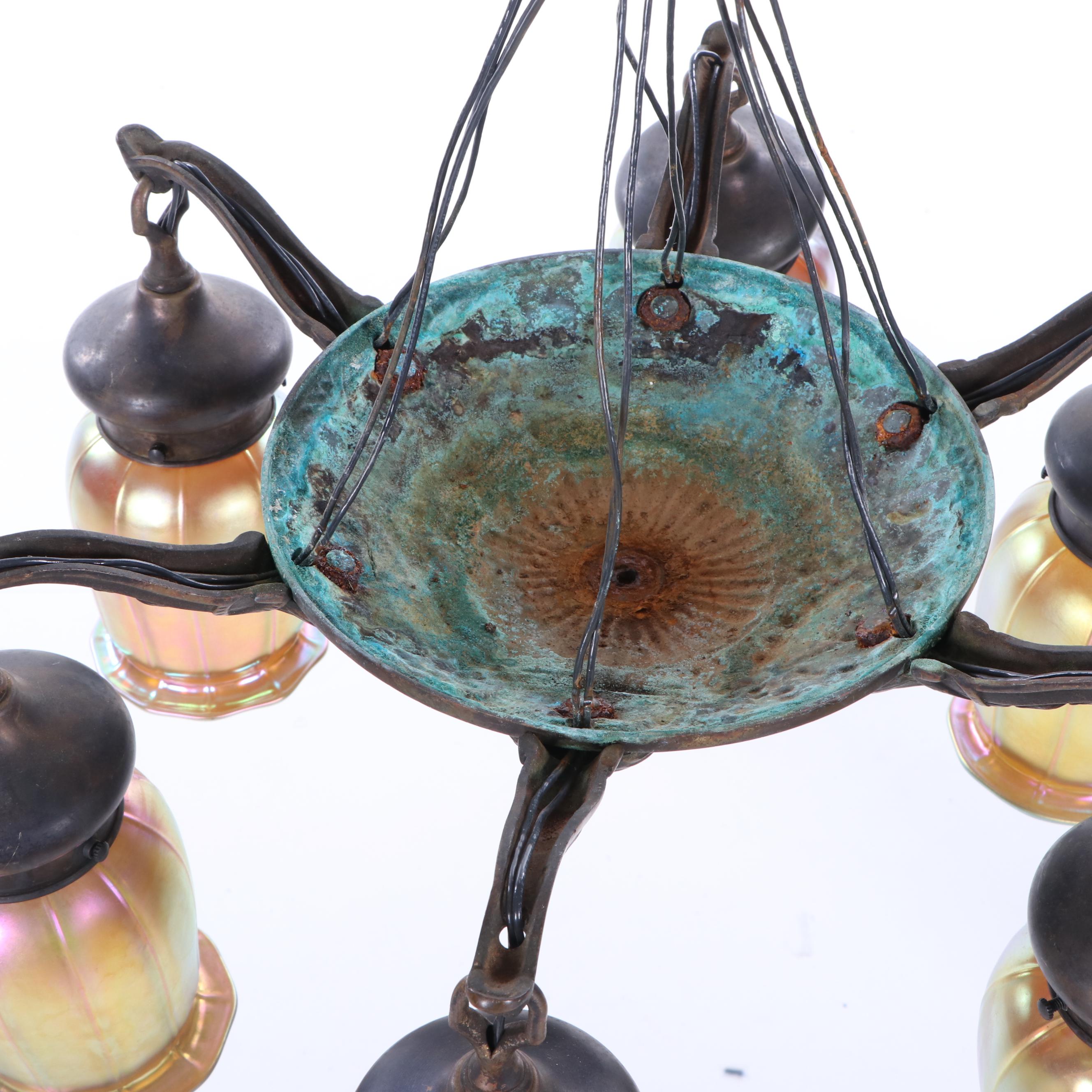 Iridescent Glass Shades Attributed to Quezal together with a Bronze Chandelier