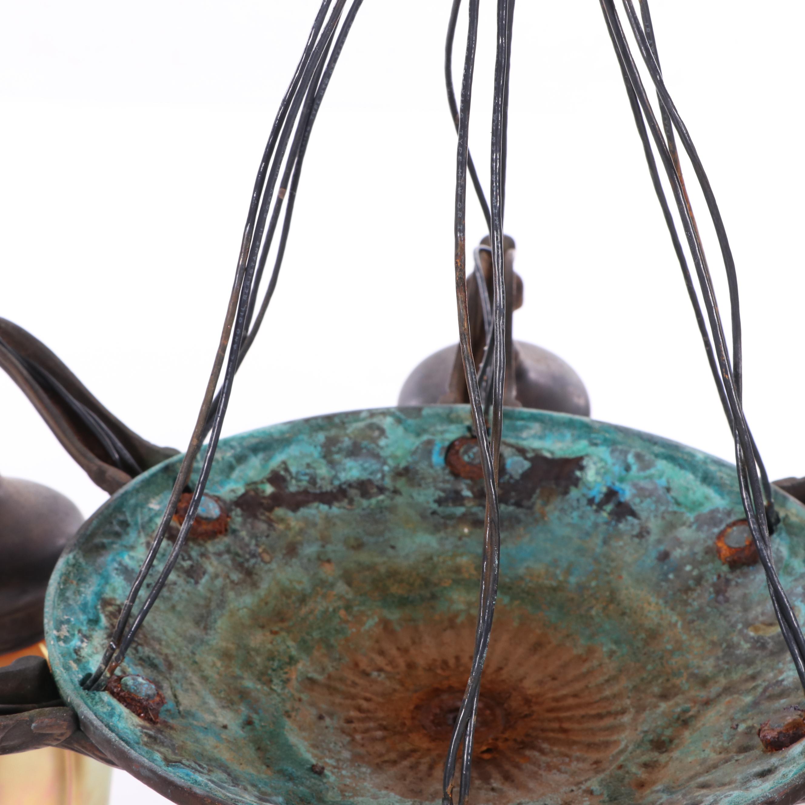 Iridescent Glass Shades Attributed to Quezal together with a Bronze Chandelier