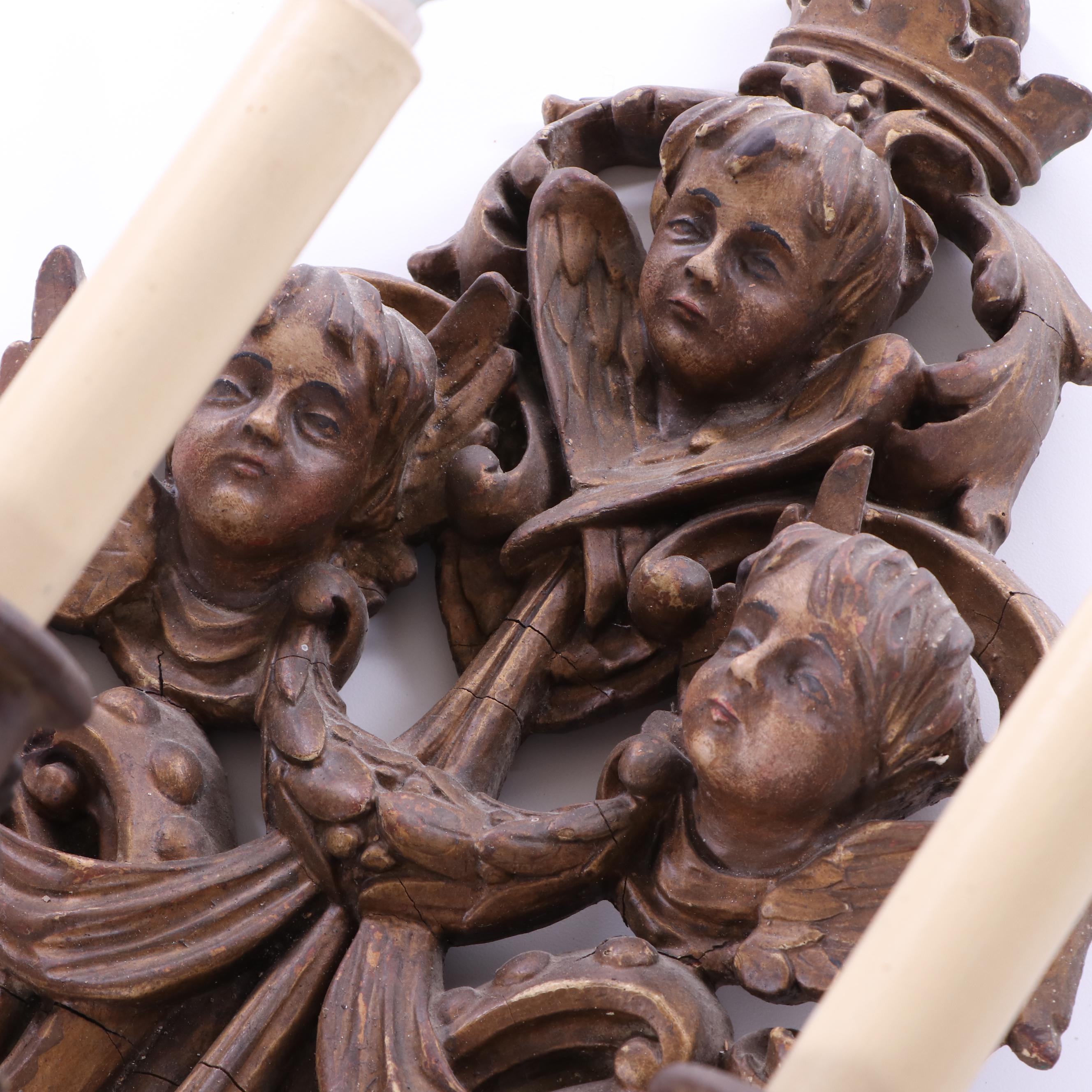 Antique Three-Arm Putti Figural Composite and Metal Wall Sconces