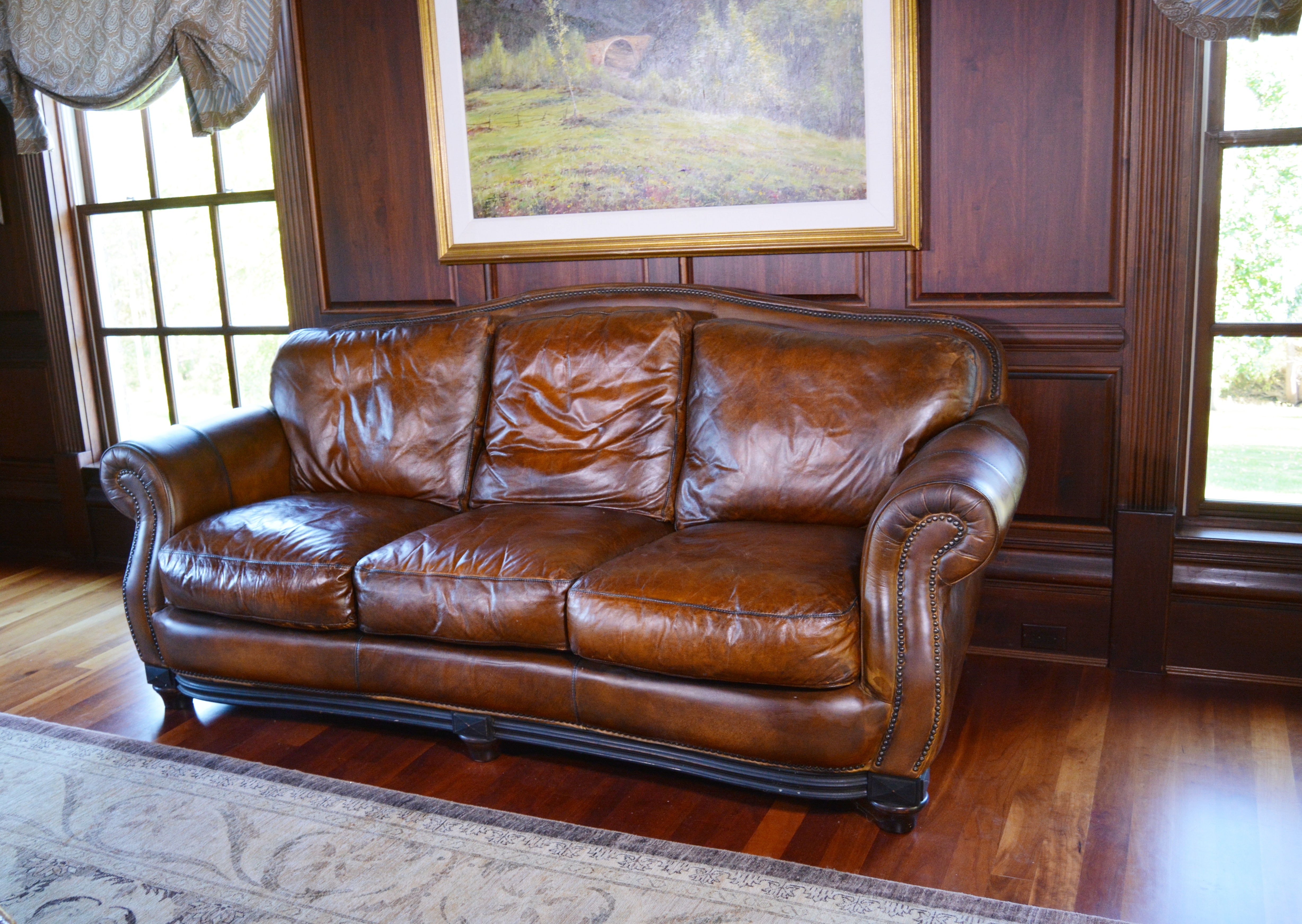 Contemporary Camelback Leather Sofa by Haverty's