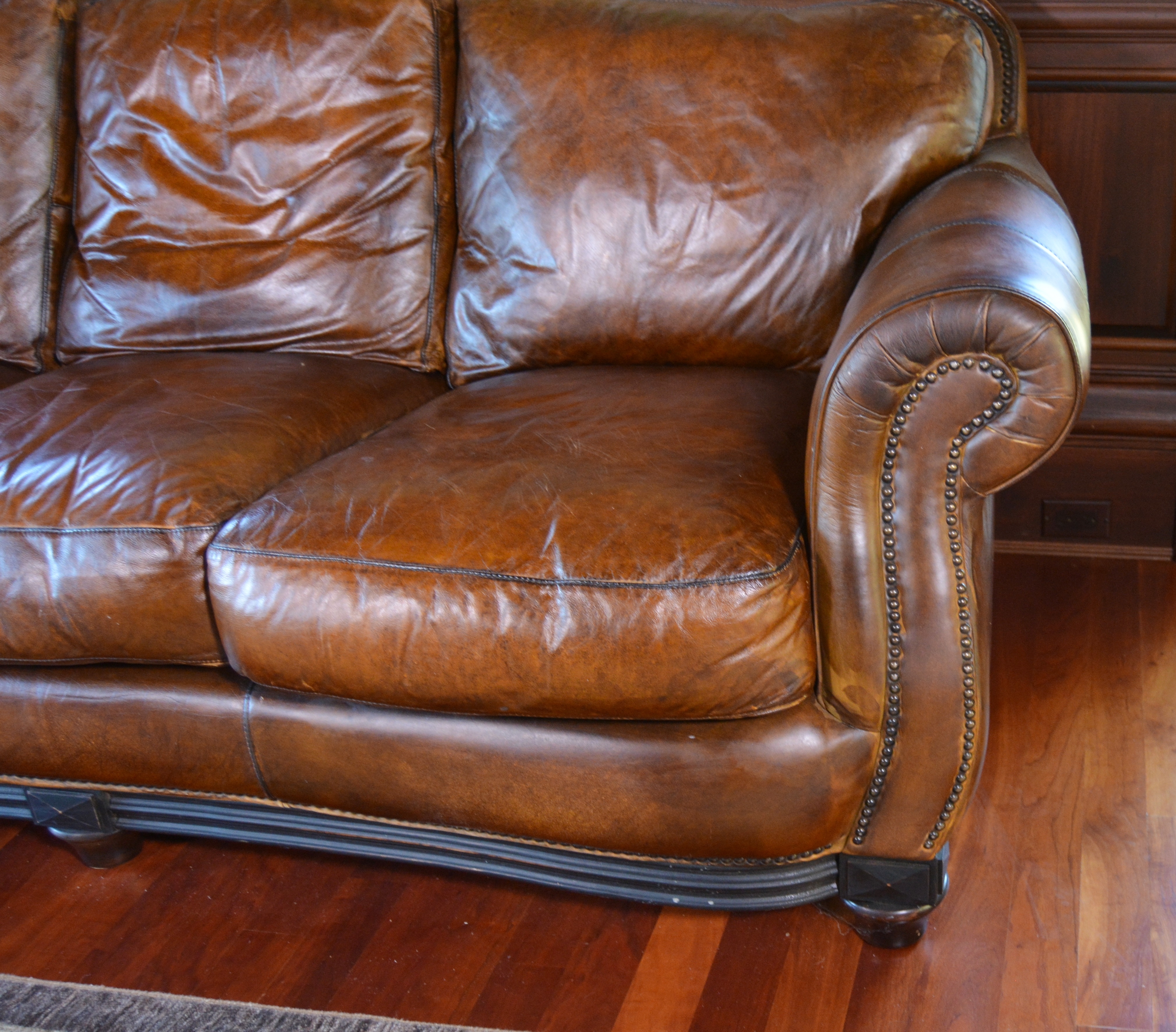 Contemporary Camelback Leather Sofa by Haverty's