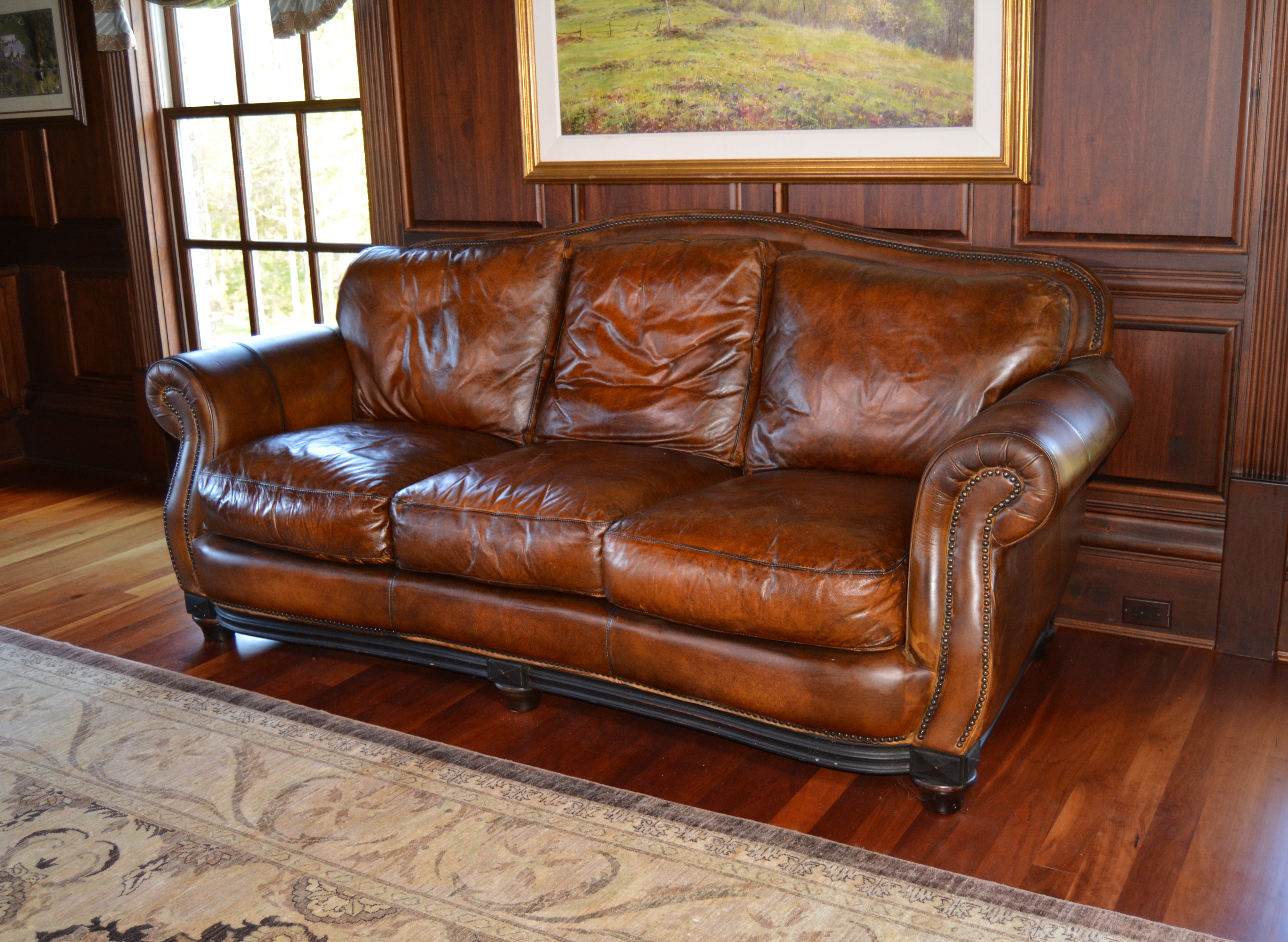 Contemporary Camelback Leather Sofa by Haverty's