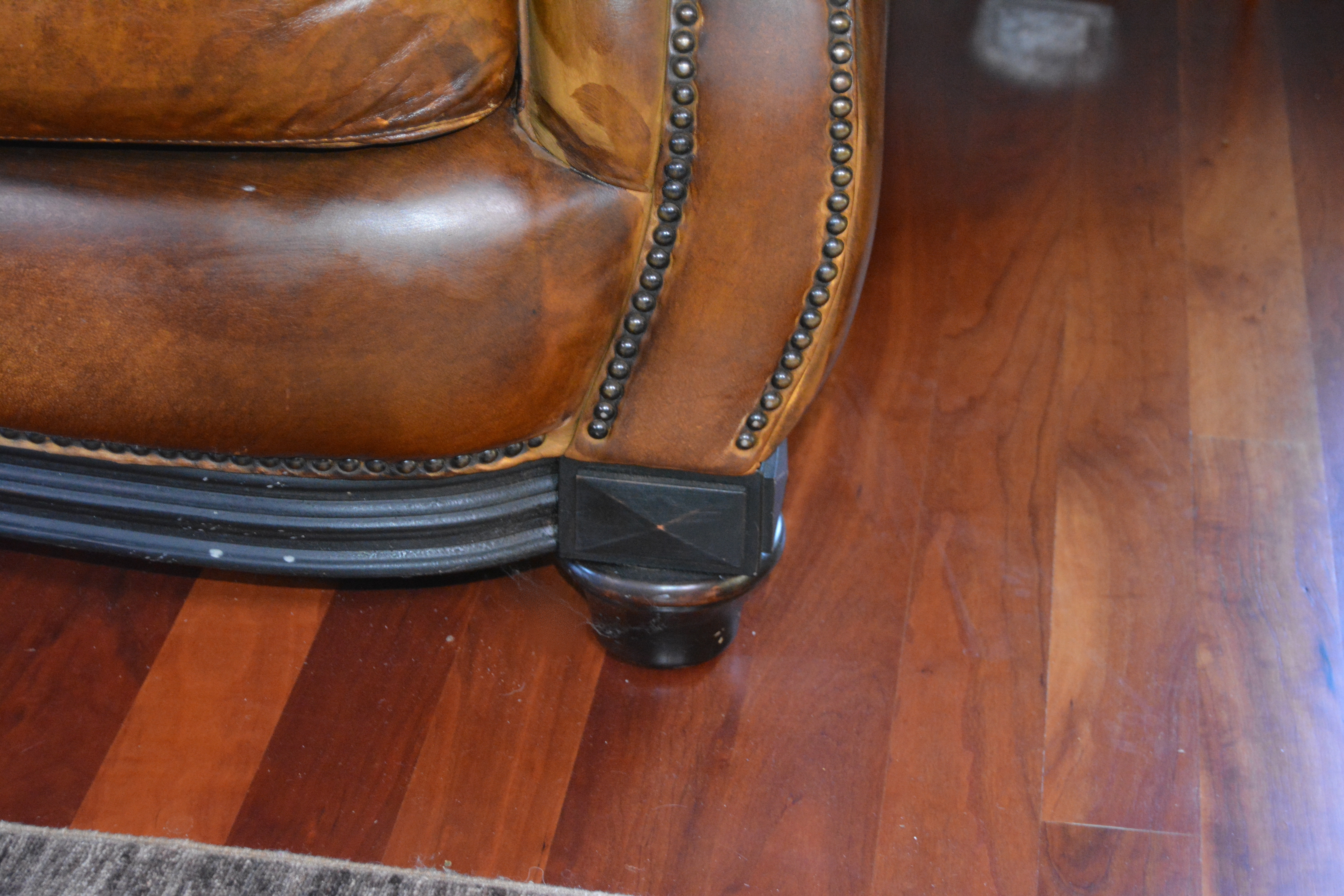 Contemporary Camelback Leather Sofa by Haverty's