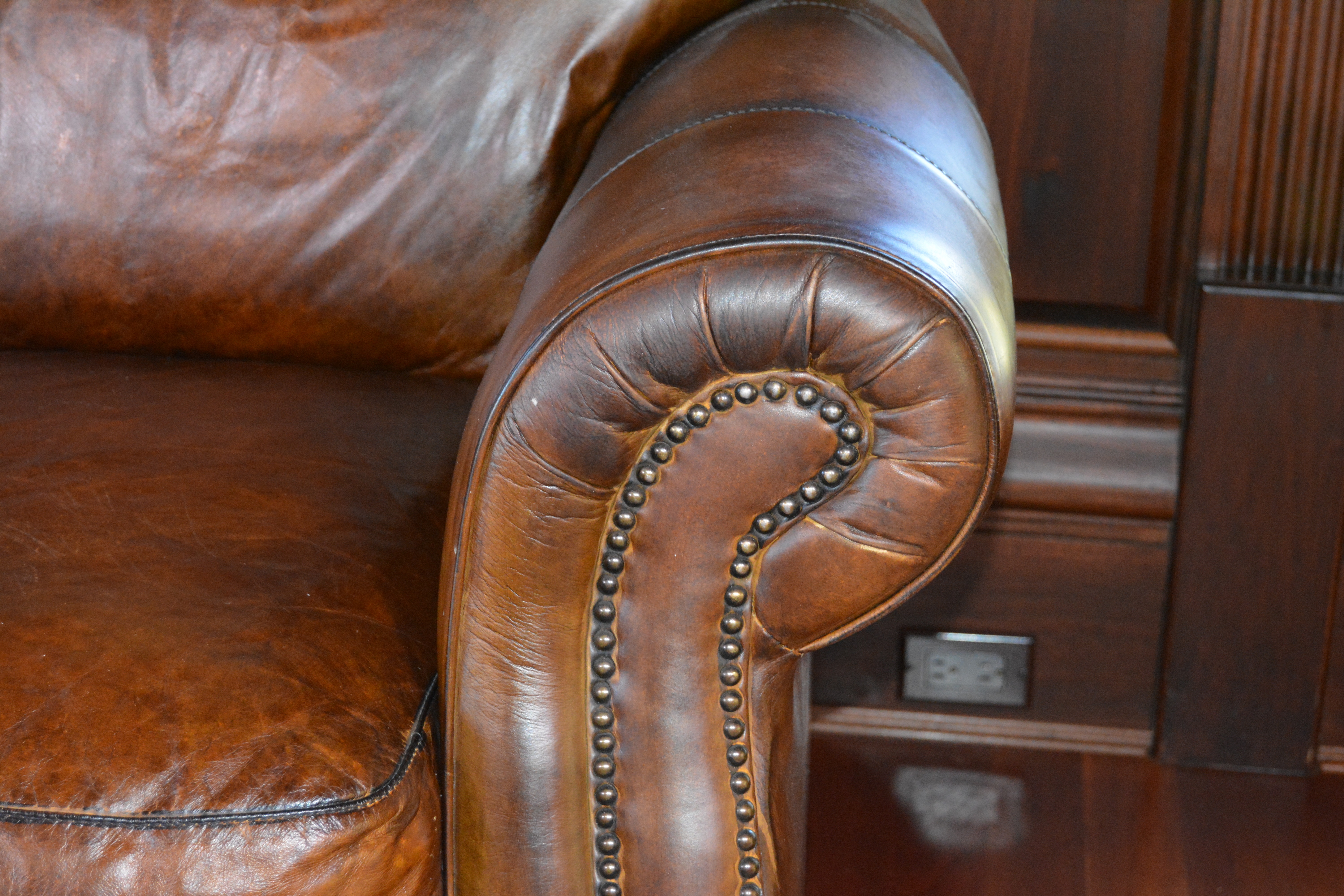 Contemporary Camelback Leather Sofa by Haverty's