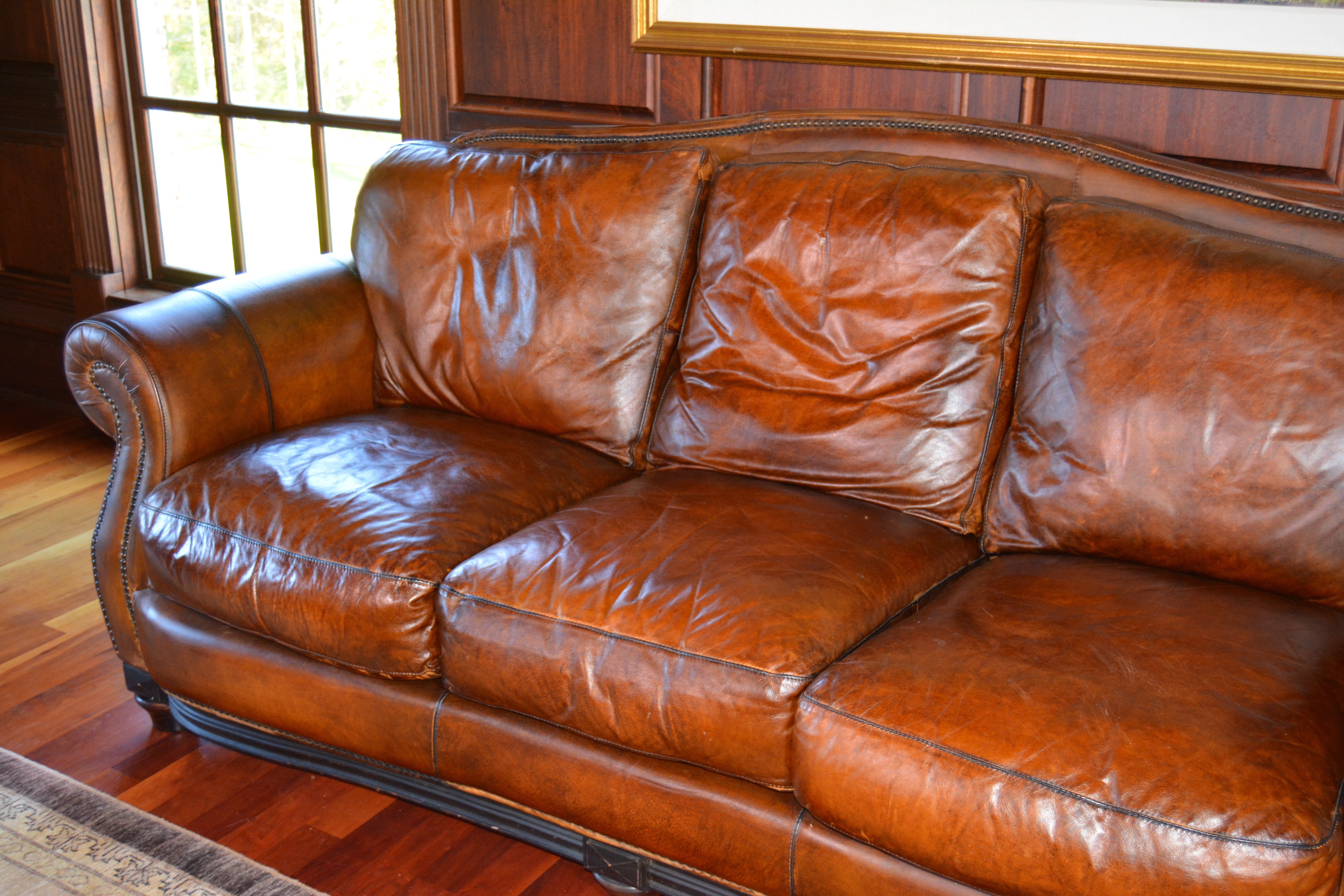Contemporary Camelback Leather Sofa by Haverty's