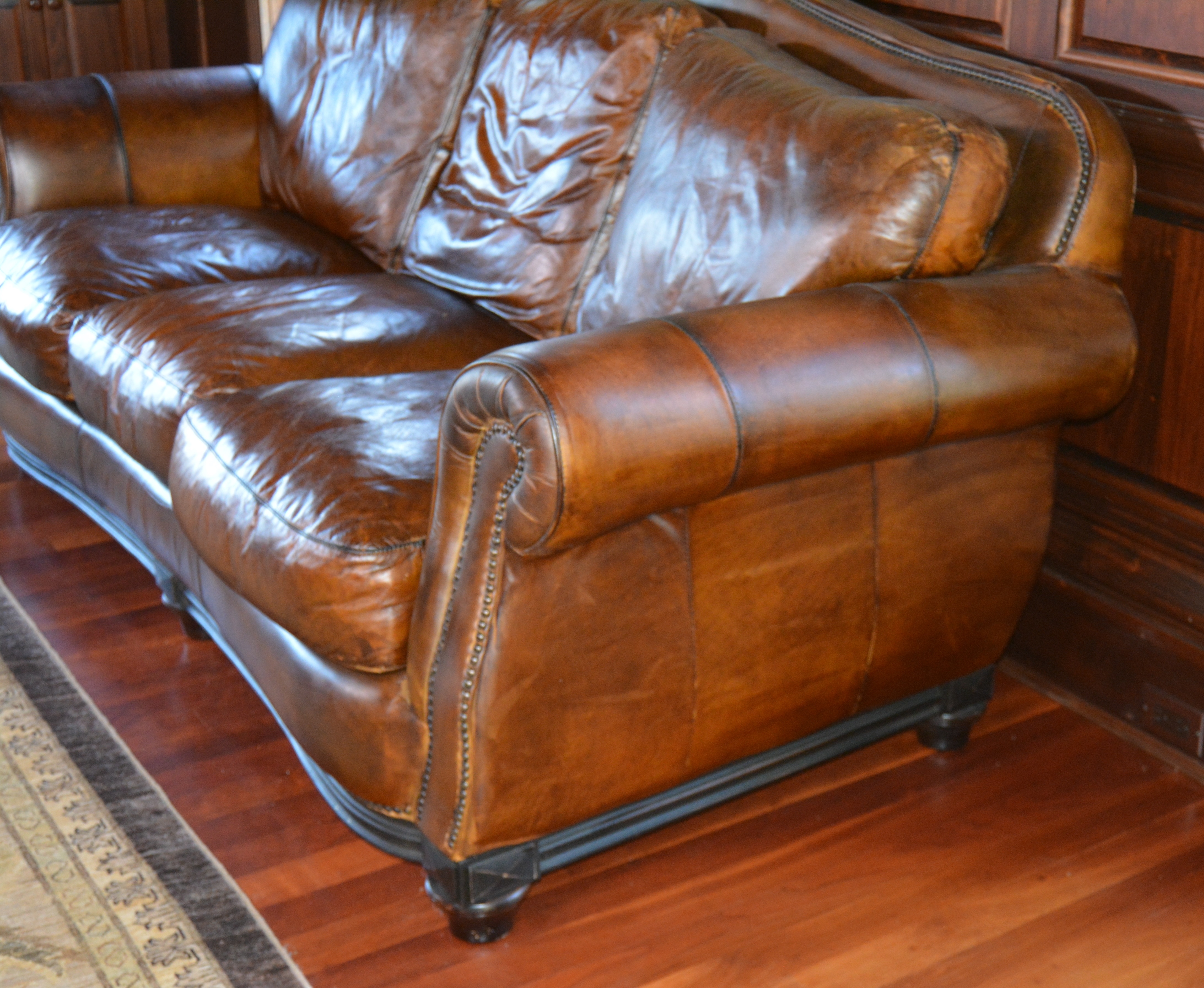 Contemporary Camelback Leather Sofa by Haverty's