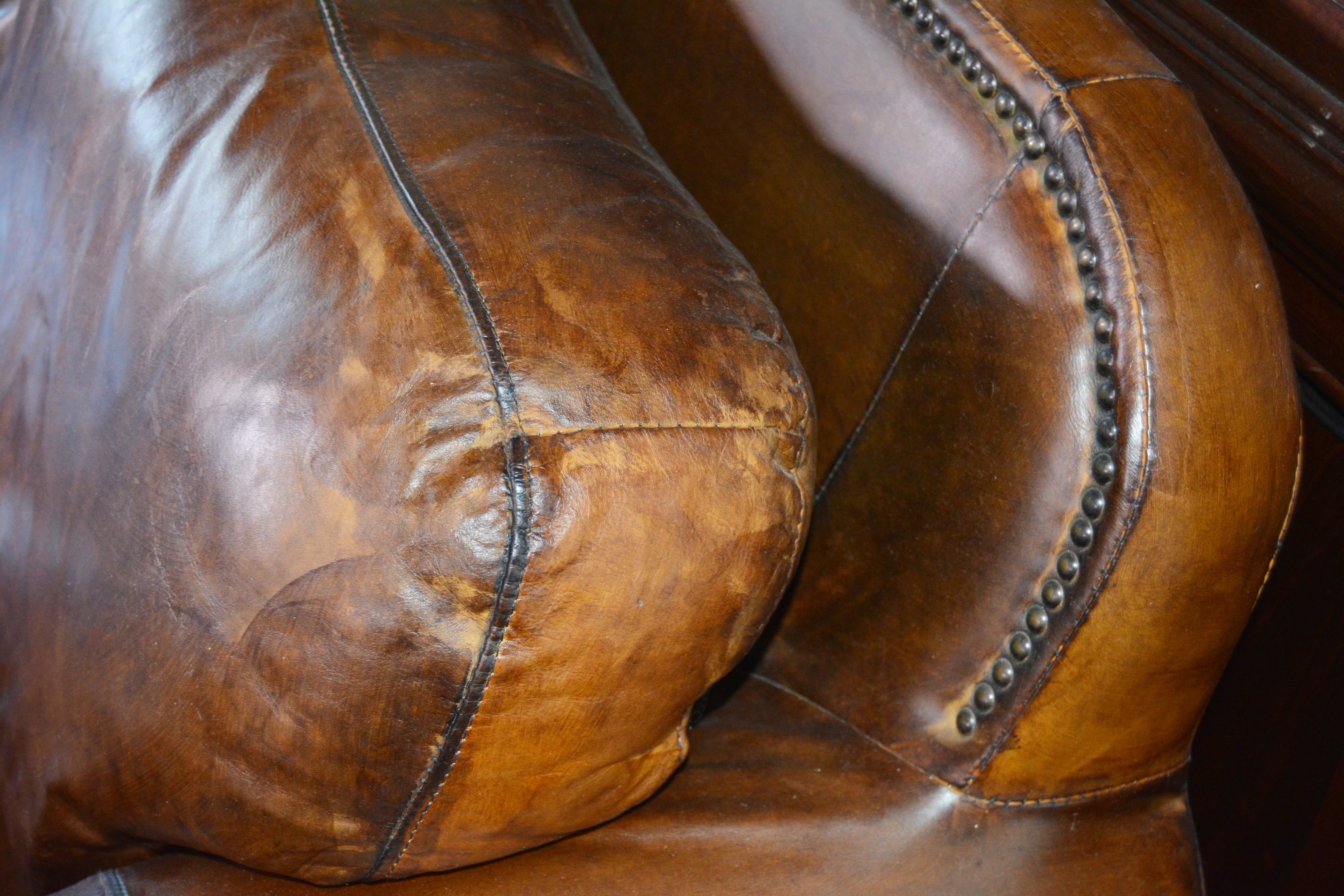 Contemporary Camelback Leather Sofa by Haverty's