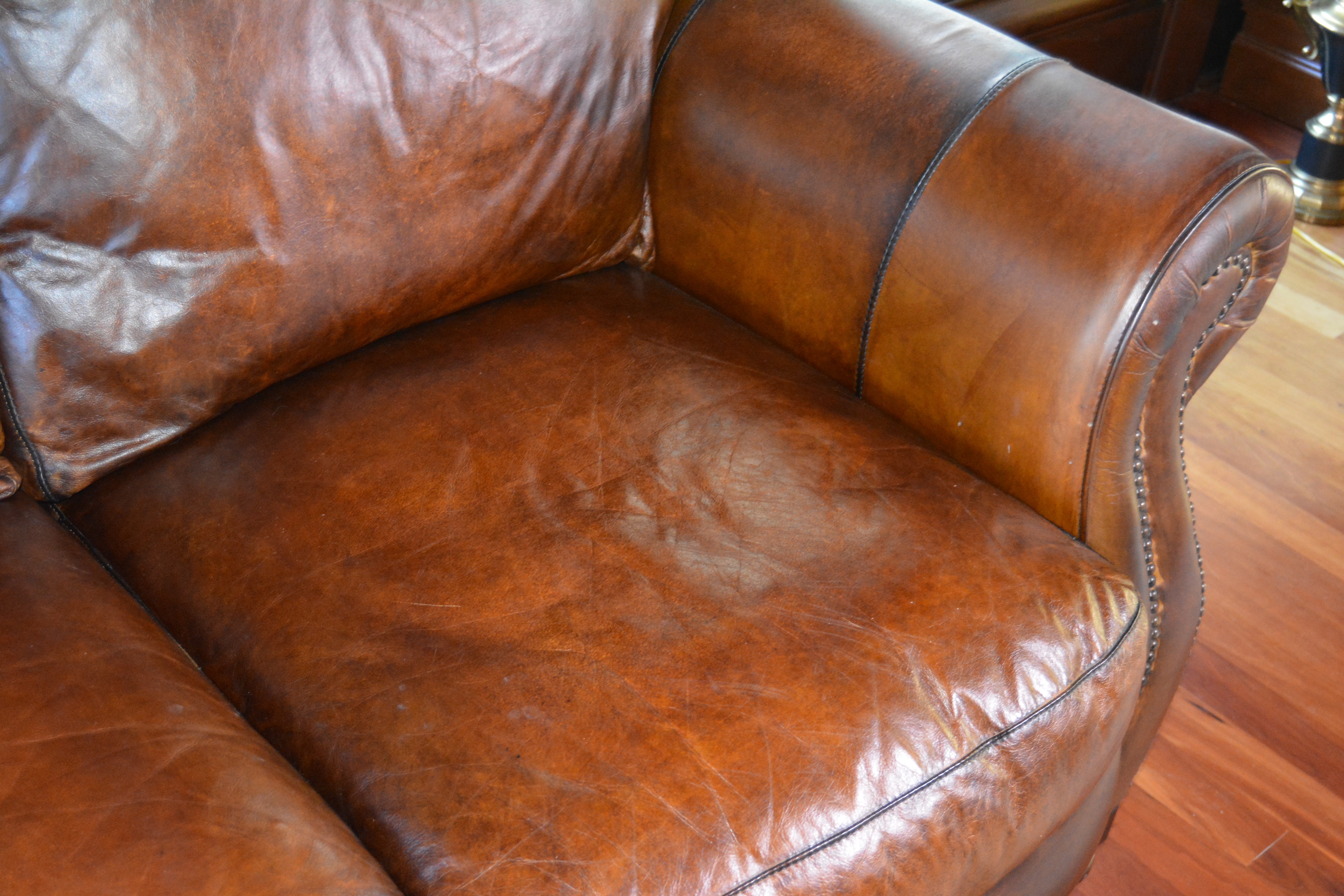 Contemporary Camelback Leather Sofa by Haverty's
