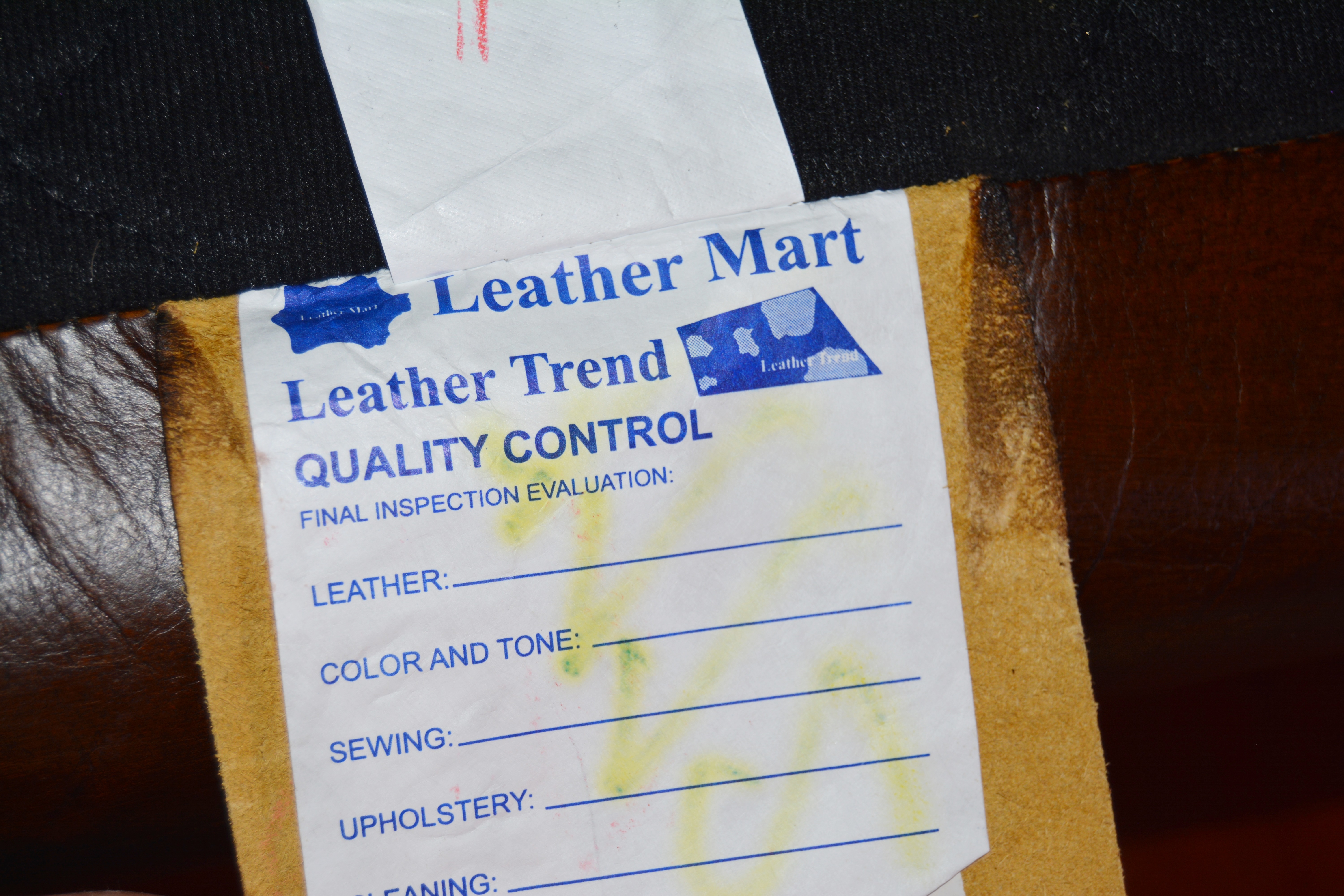 Contemporary Camelback Leather Sofa by Haverty's