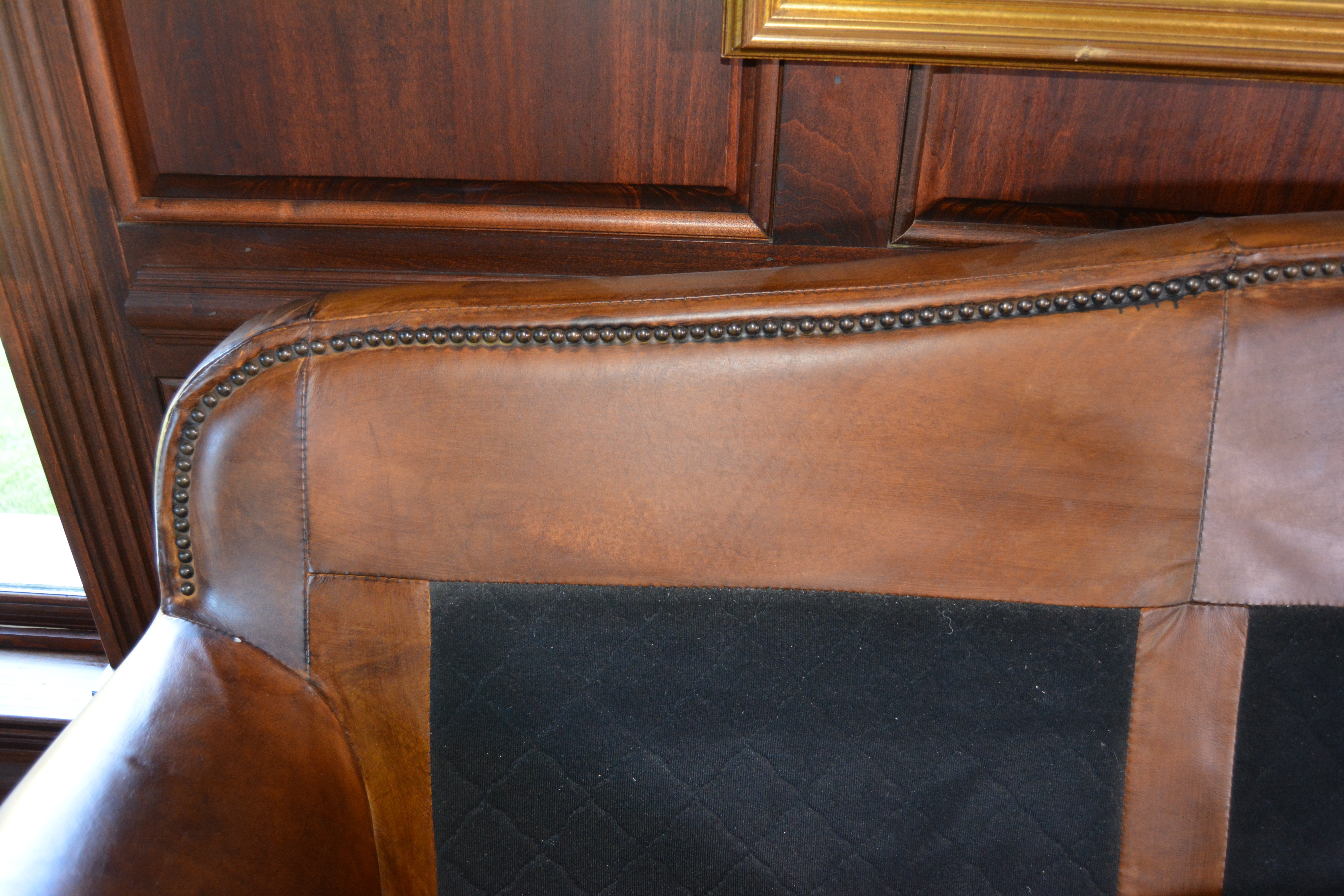 Contemporary Camelback Leather Sofa by Haverty's