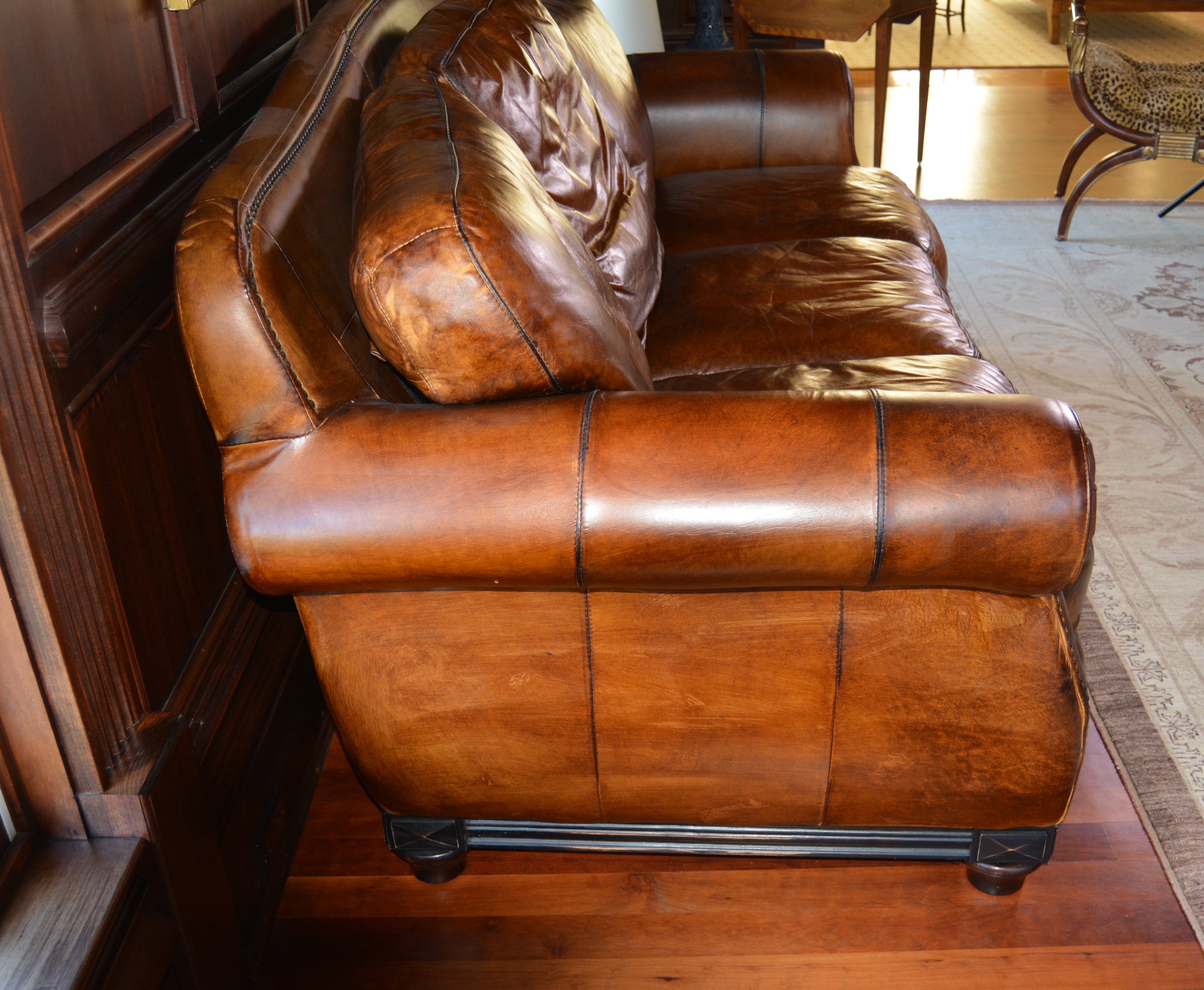 Contemporary Camelback Leather Sofa by Haverty's