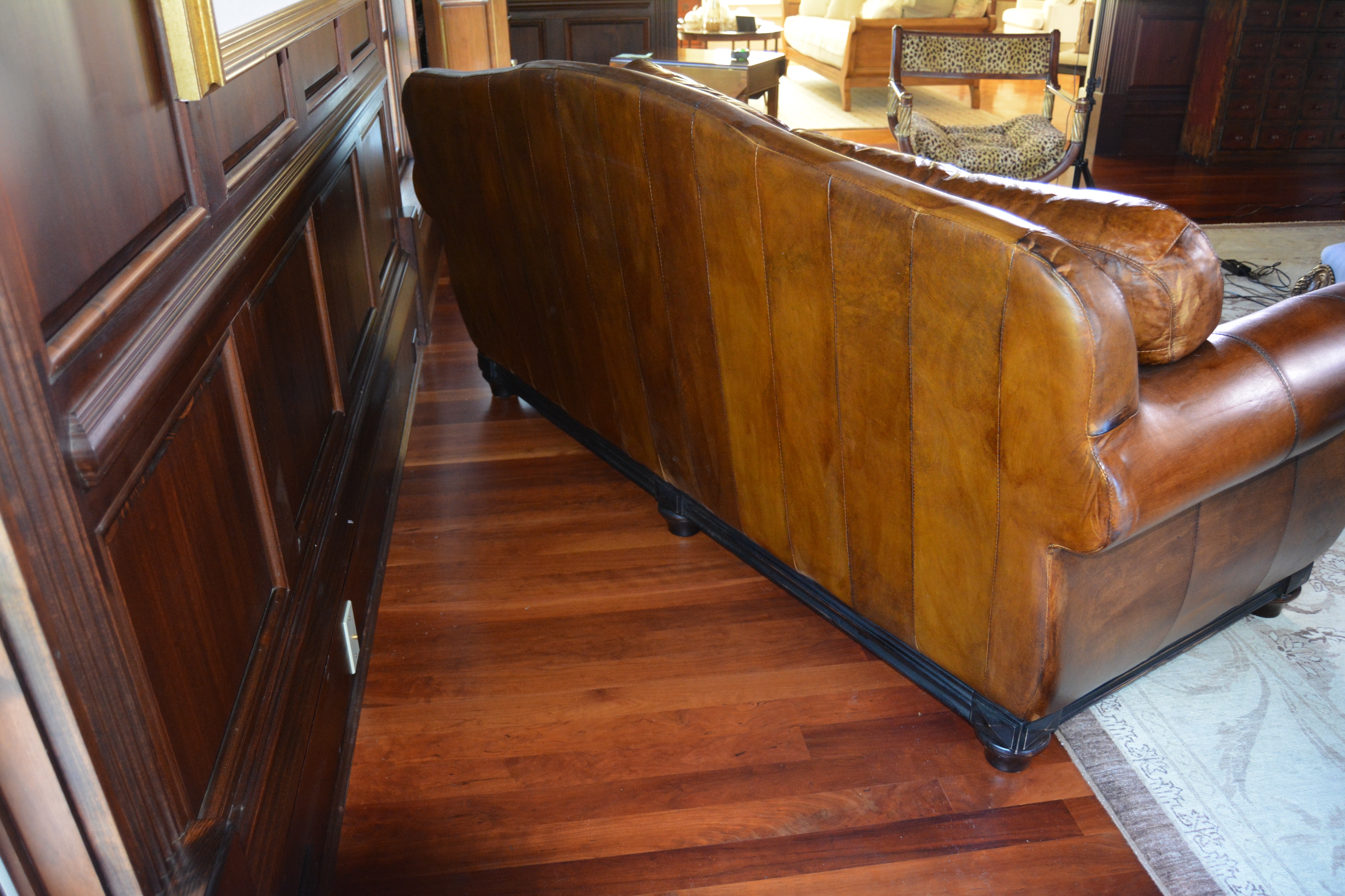 Contemporary Camelback Leather Sofa by Haverty's