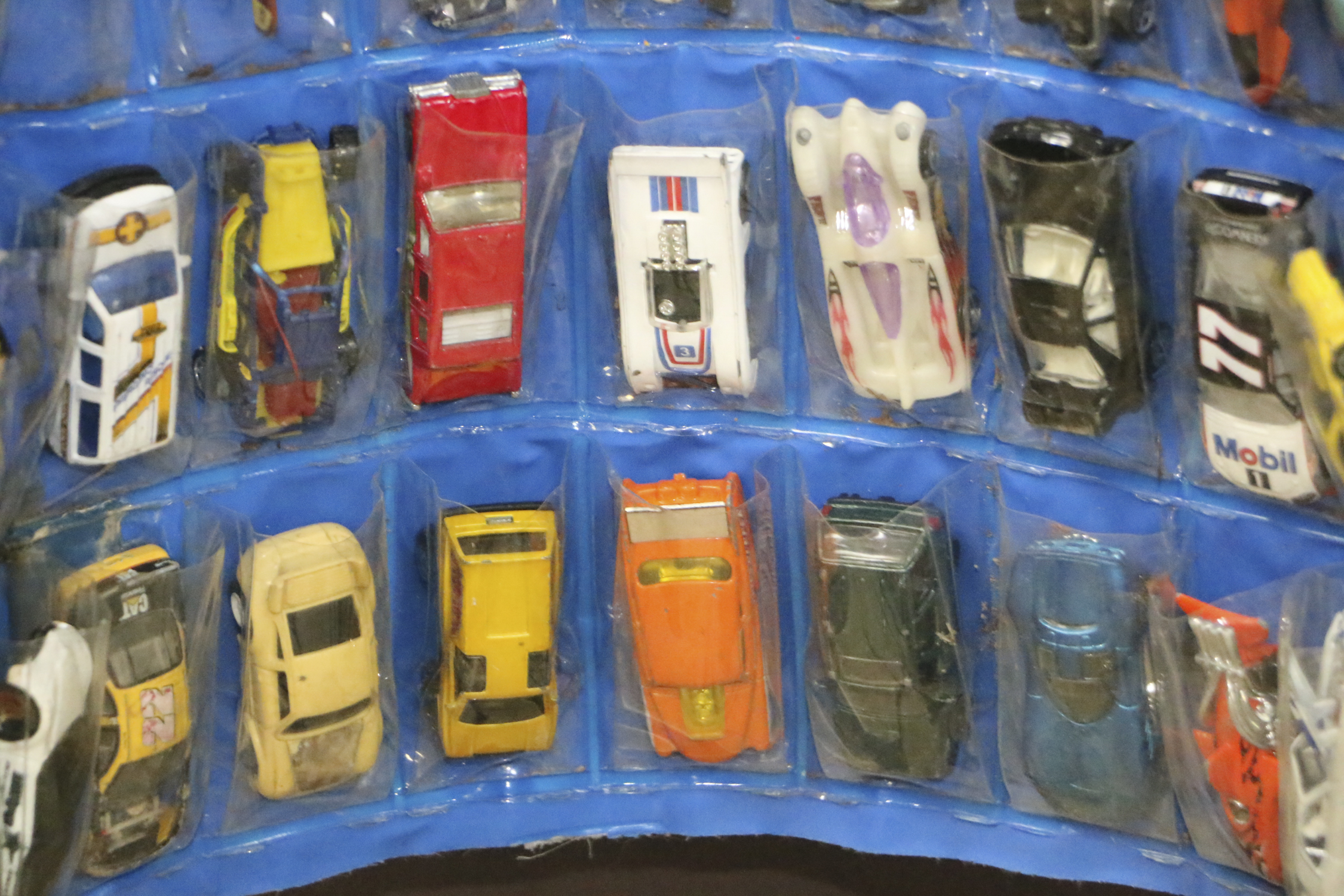 Miniature Die-Cast Cars in Hot Wheels Hanging Case