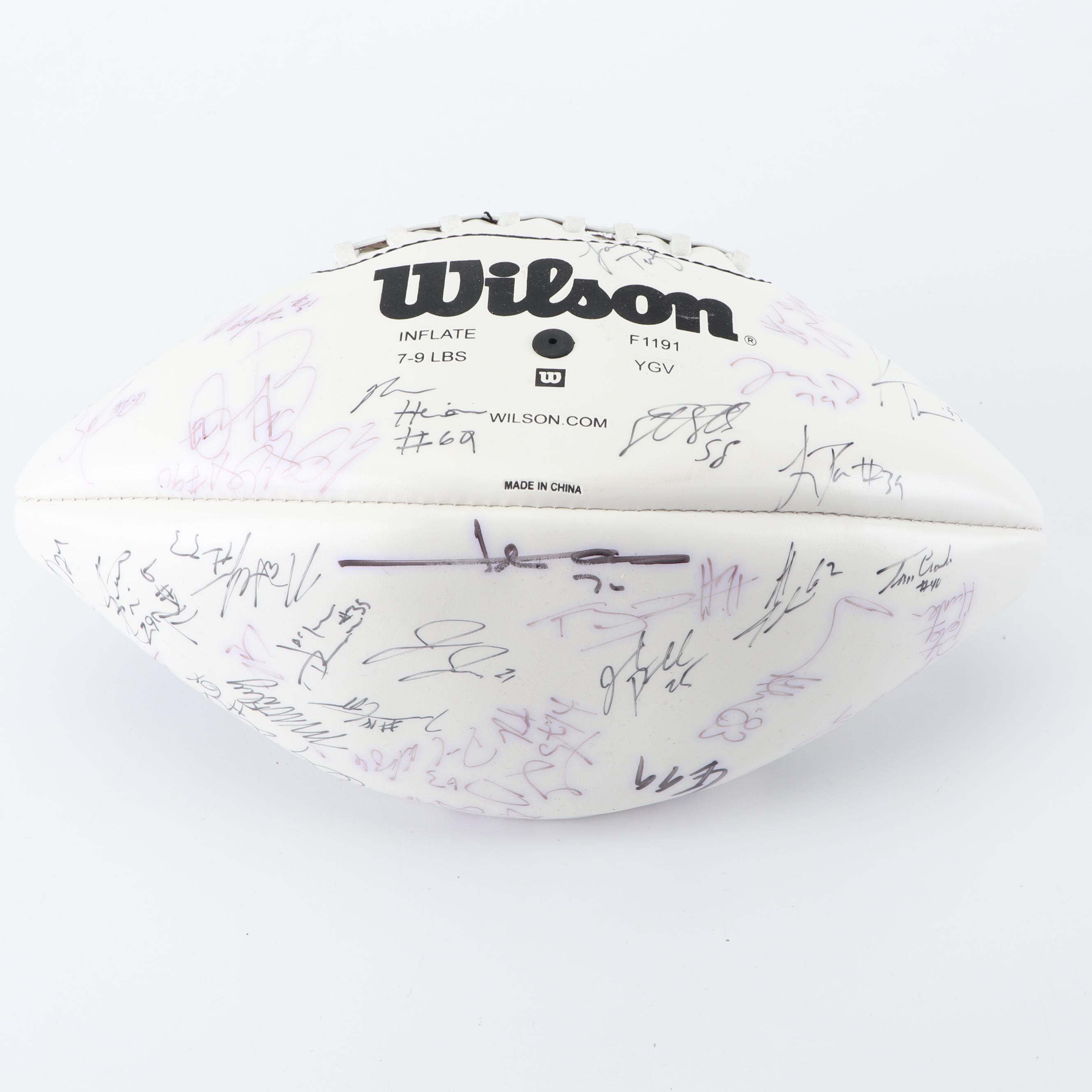 Dallas Cowboys Football Autographed by Tony Romo, Paul Taglaibue and Others
