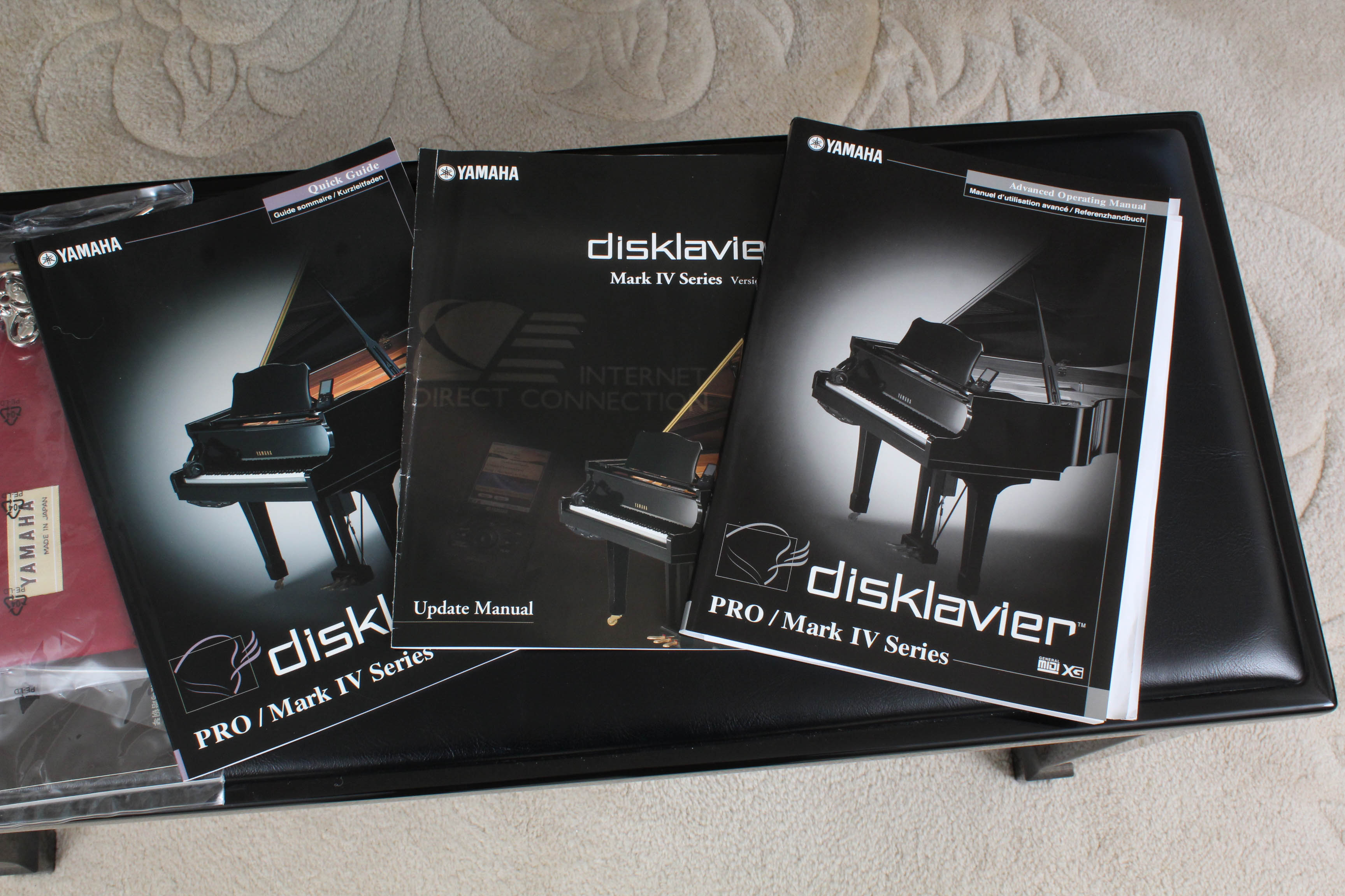 Yamaha Disklavier C2 Baby Grand Piano in Polished Ebony with Bench