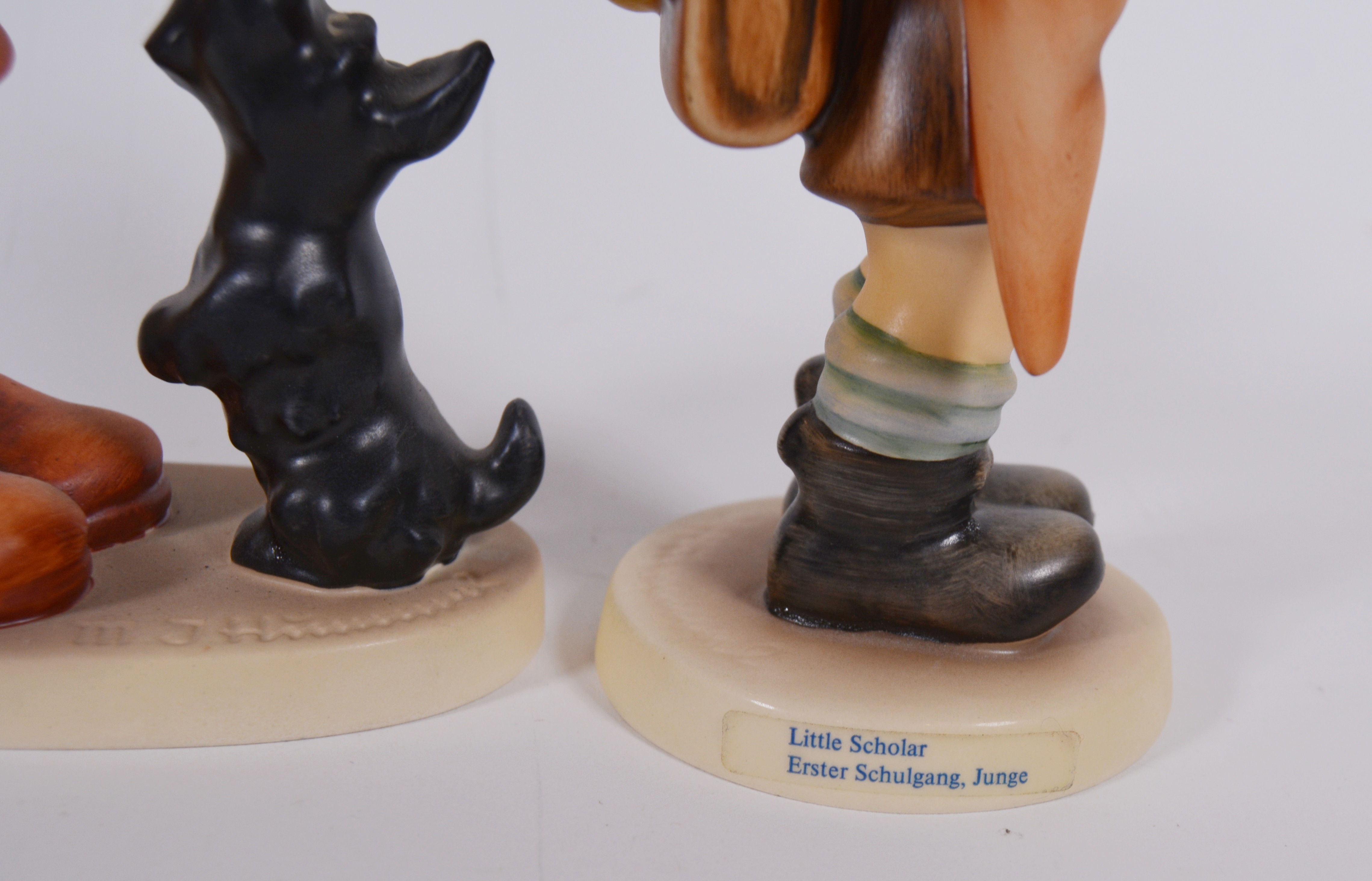 Goebel M.I. Hummel "Little Scholar" and "Begging His Share" Porcelain Figurines