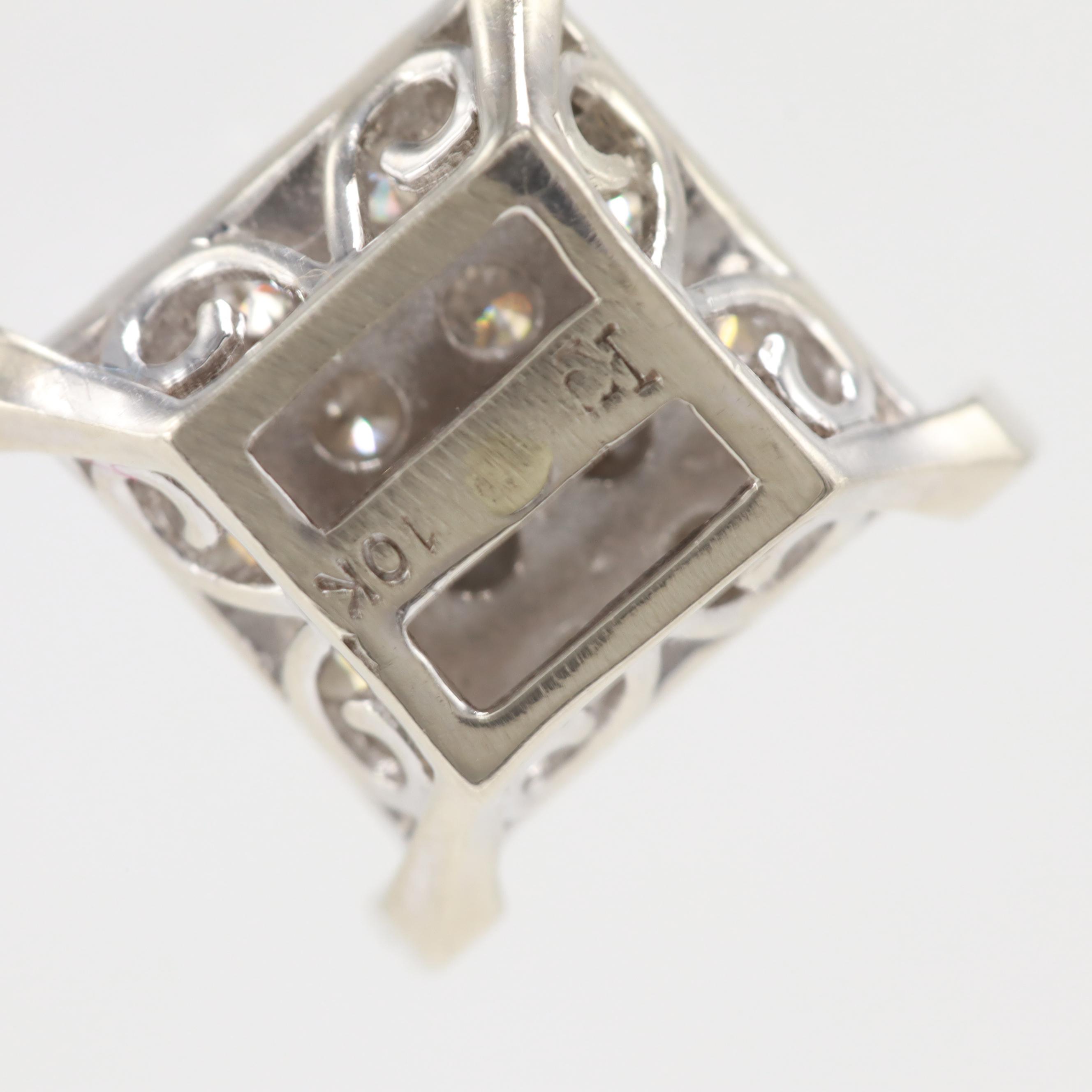 10K White Gold 0.64 CTW Diamond Pendant