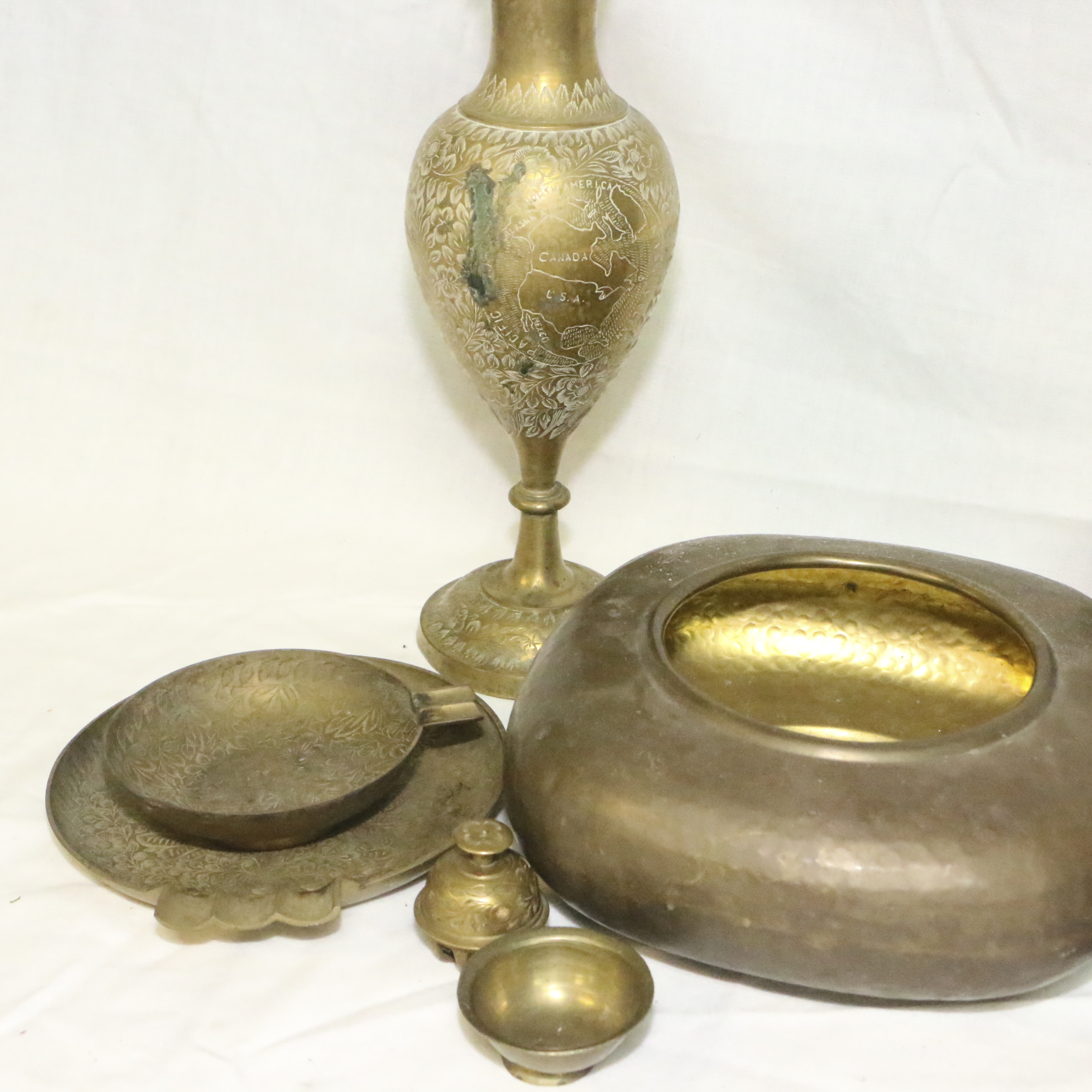 Brass Decor Items including Geographical Etched Vase, Swan Figurines and Other