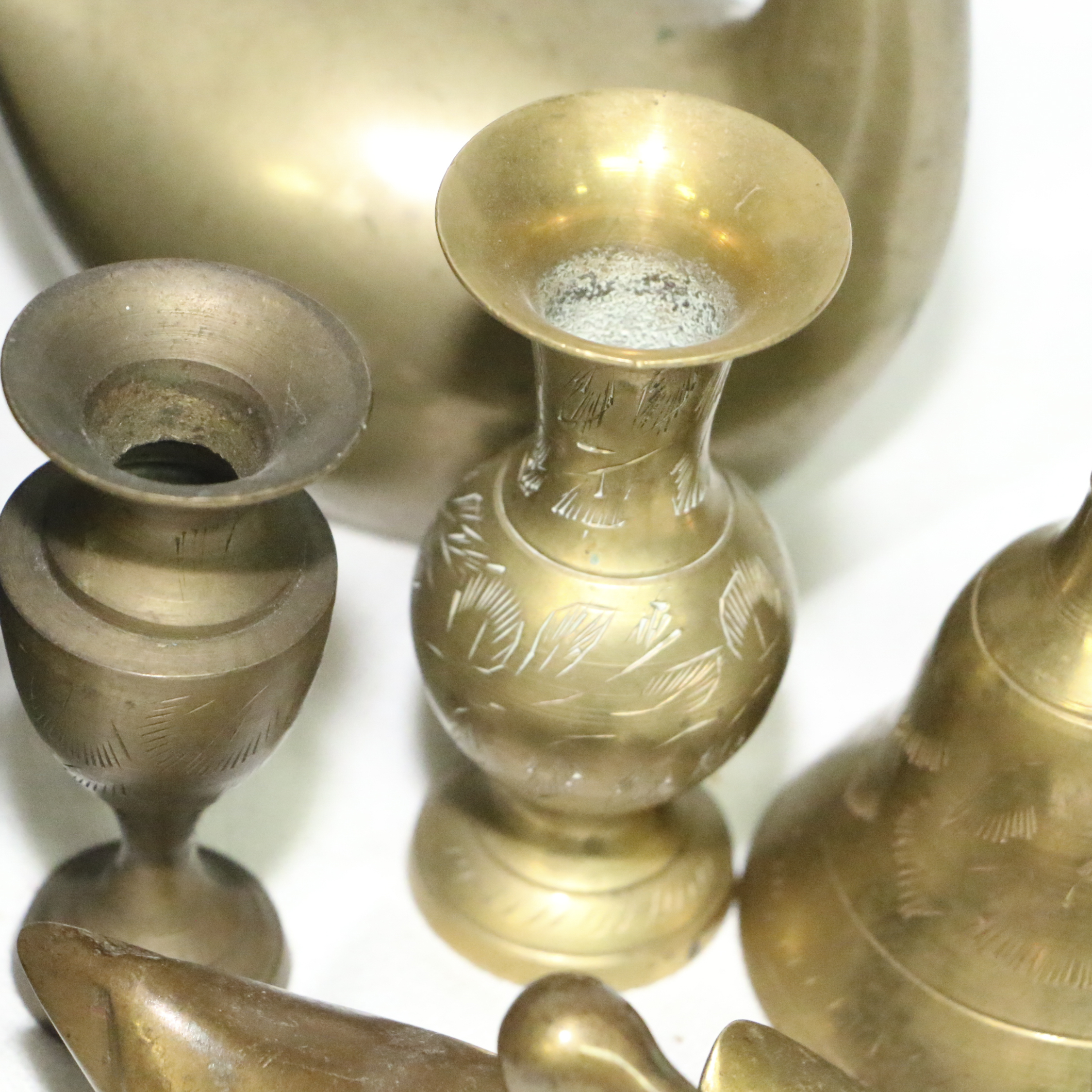 Brass Decor Items including Geographical Etched Vase, Swan Figurines and Other