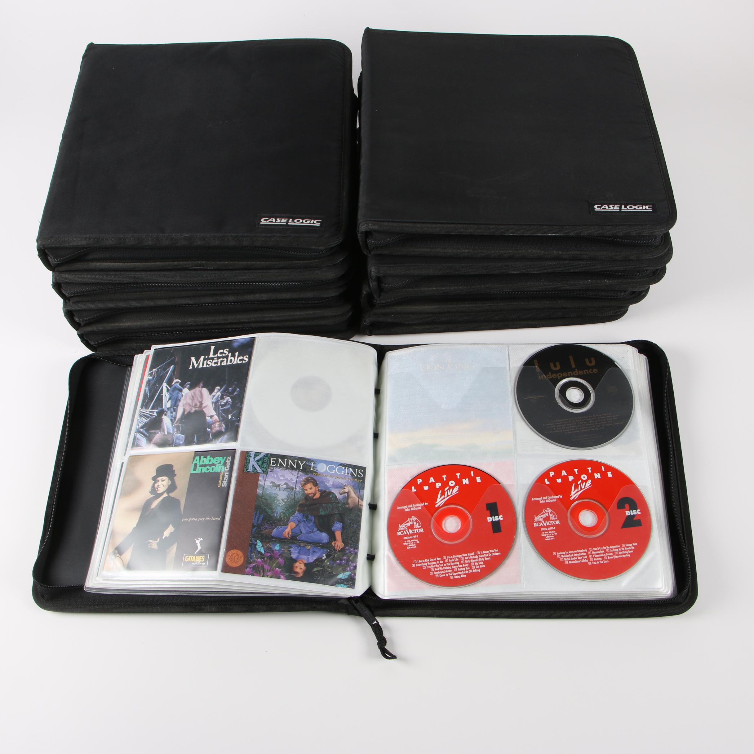 Case Logic Wallets with CDs including Mariah Carey, Cher and Bon Jovi