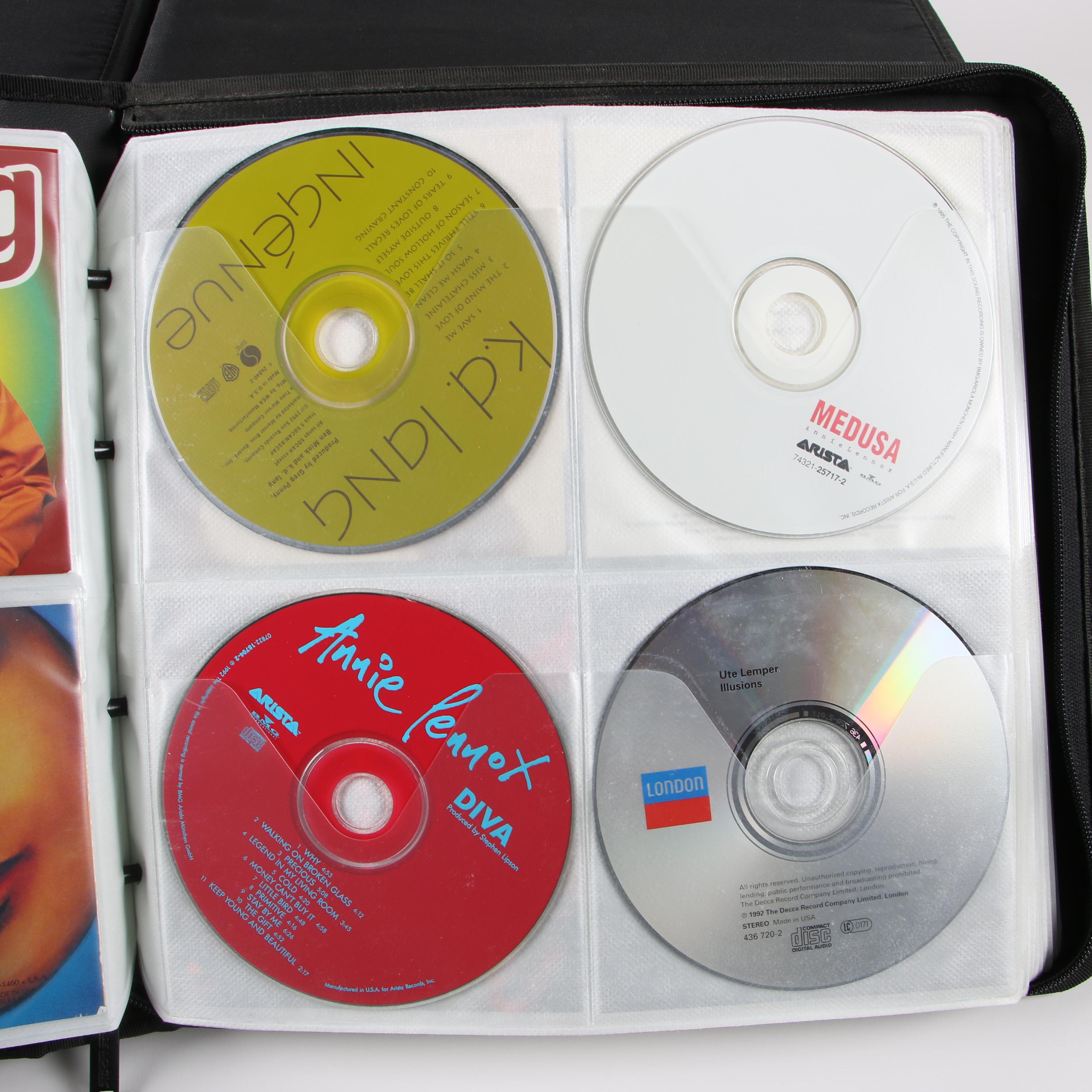 Case Logic Wallets with CDs including Mariah Carey, Cher and Bon Jovi