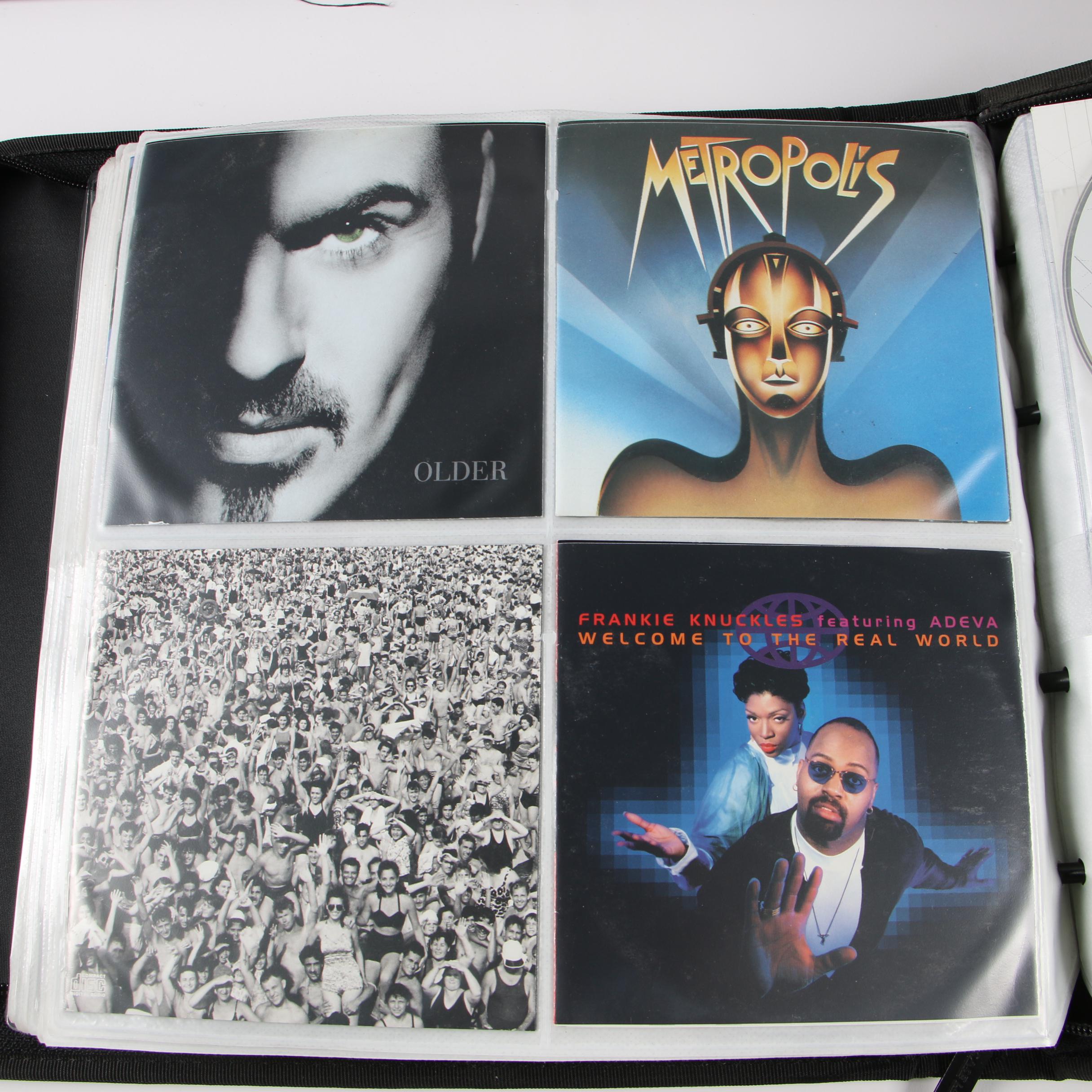 Case Logic Wallets with CDs including Mariah Carey, Cher and Bon Jovi