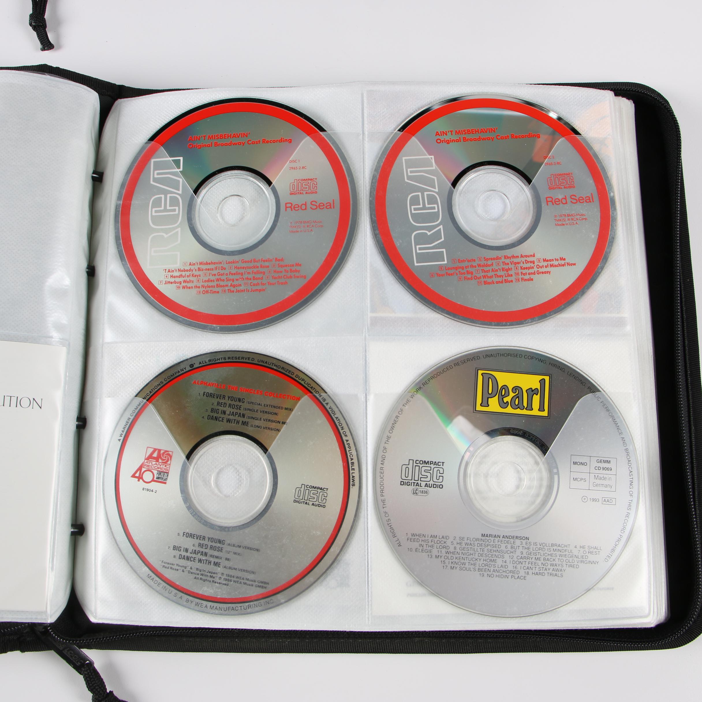 Case Logic Wallets with CDs including Mariah Carey, Cher and Bon Jovi