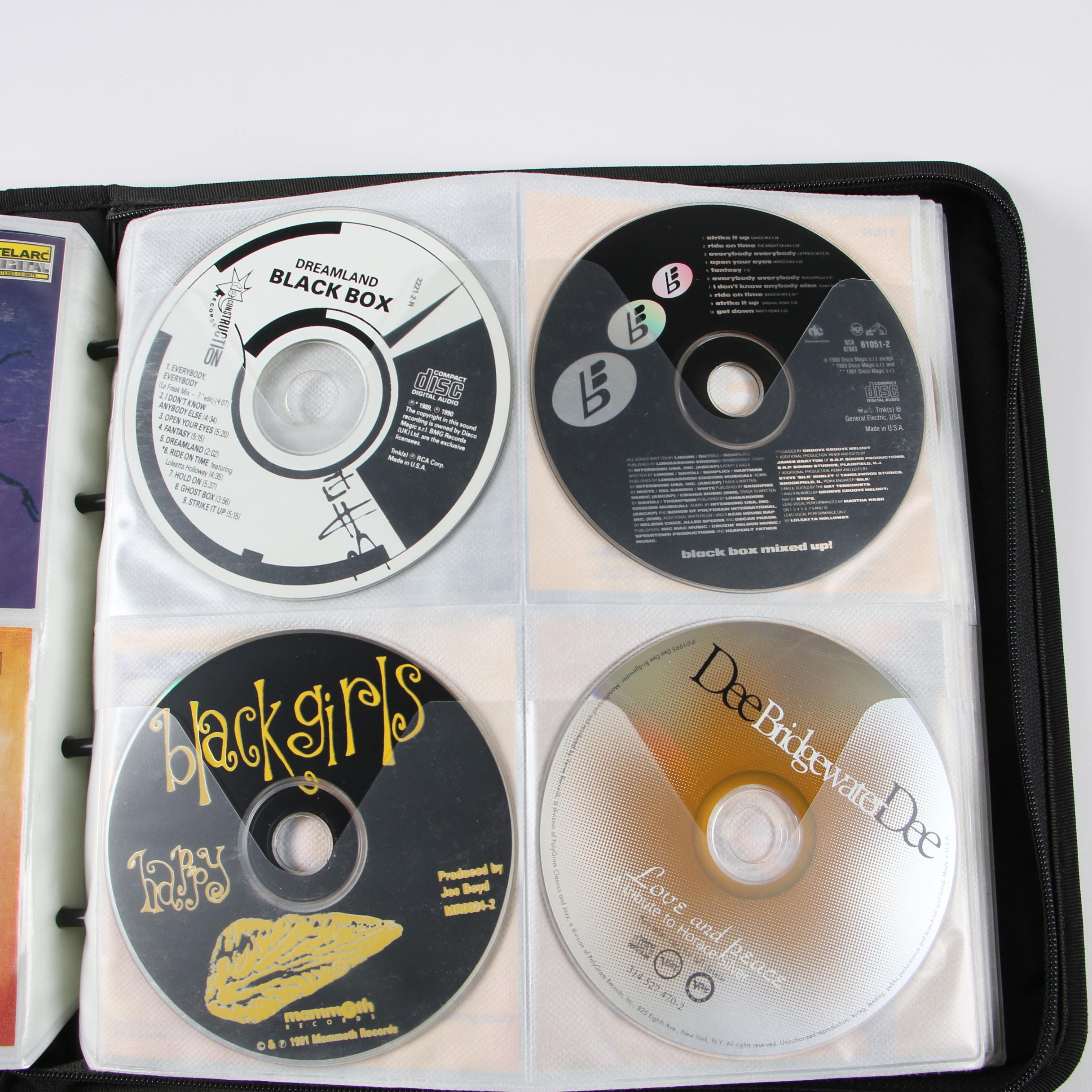 Case Logic Wallets with CDs including Mariah Carey, Cher and Bon Jovi