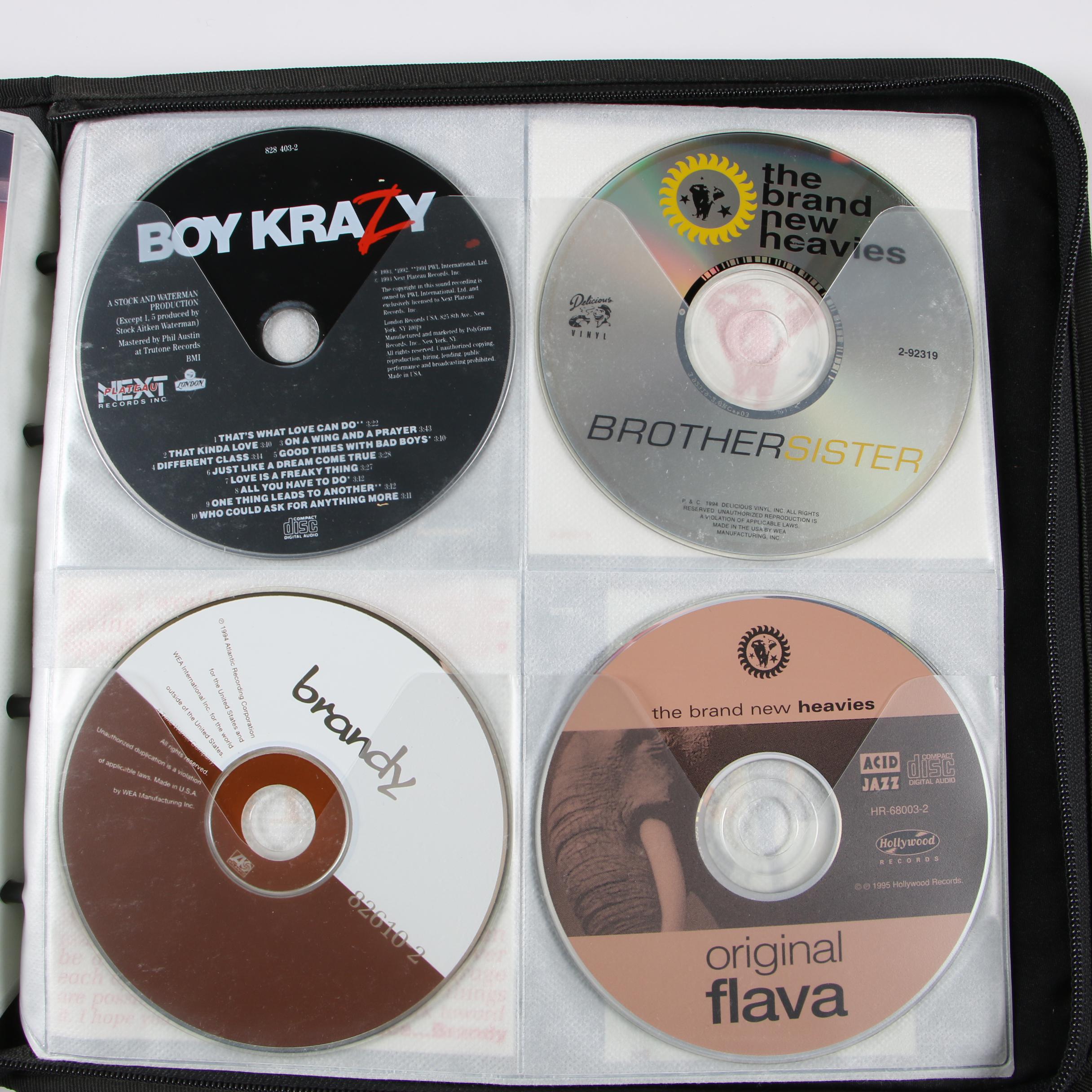 Case Logic Wallets with CDs including Mariah Carey, Cher and Bon Jovi