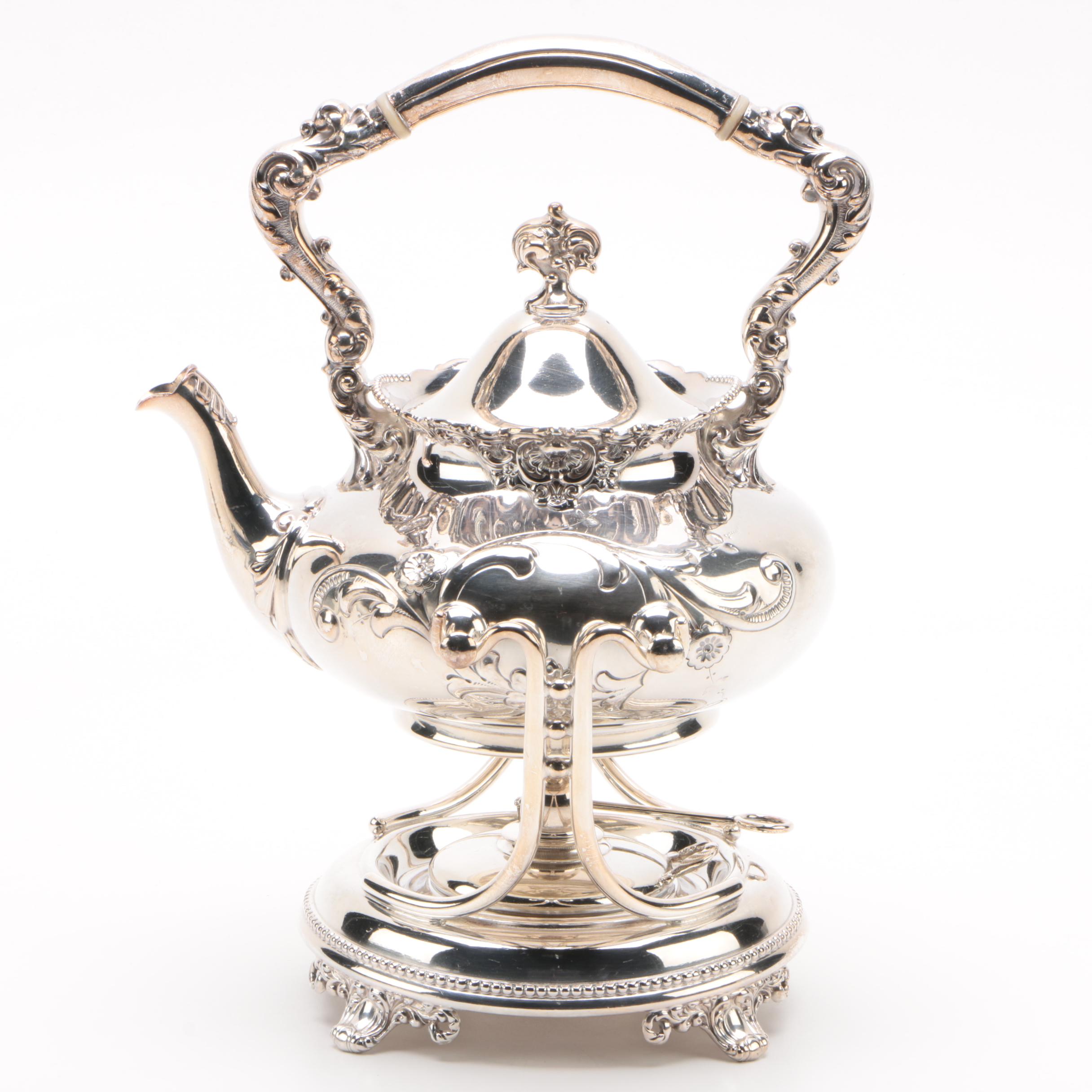 Wilcox Silver Plate Co. Repoussé Teapot with Warming Tilt Stand