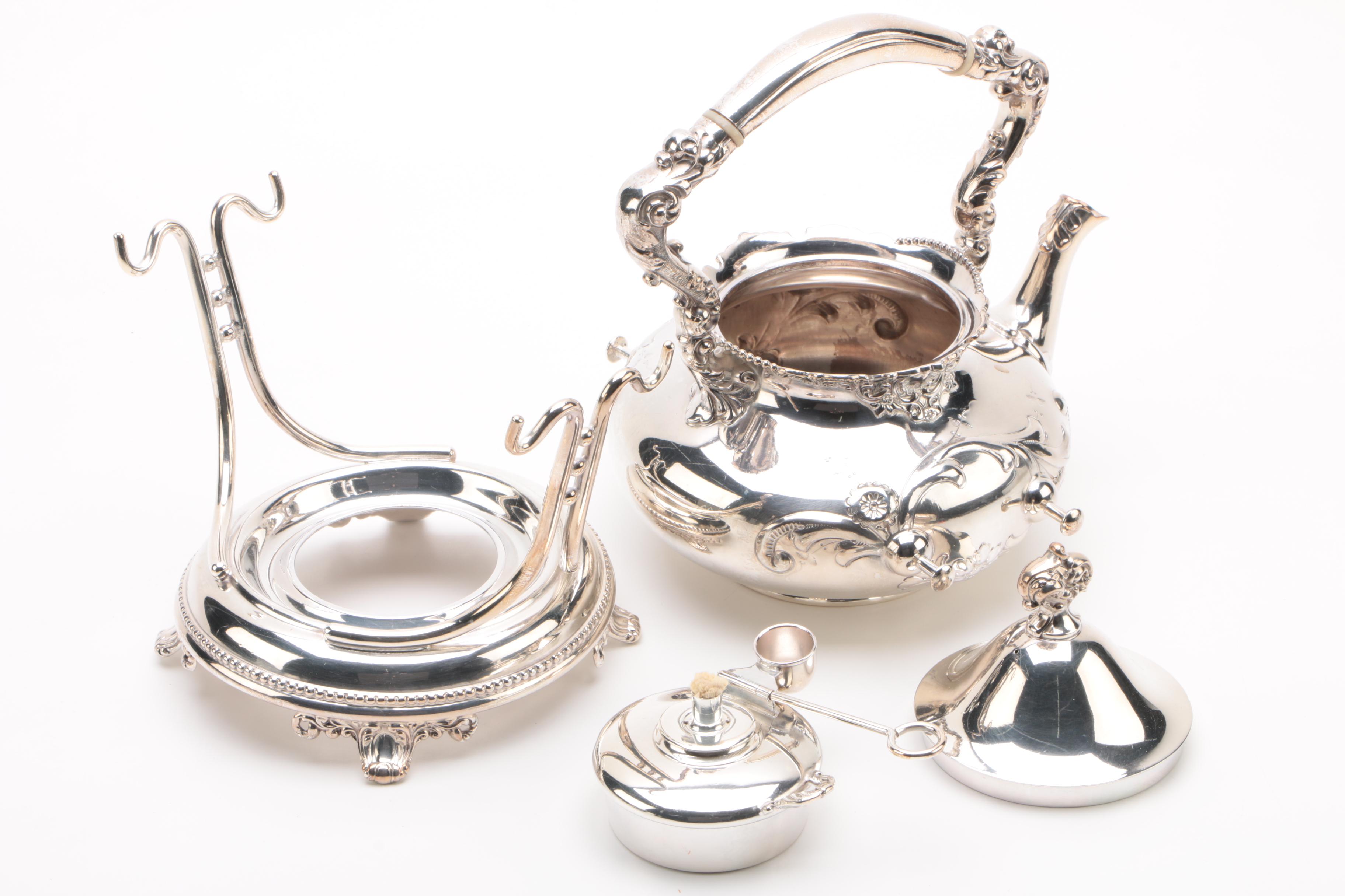Wilcox Silver Plate Co. Repoussé Teapot with Warming Tilt Stand