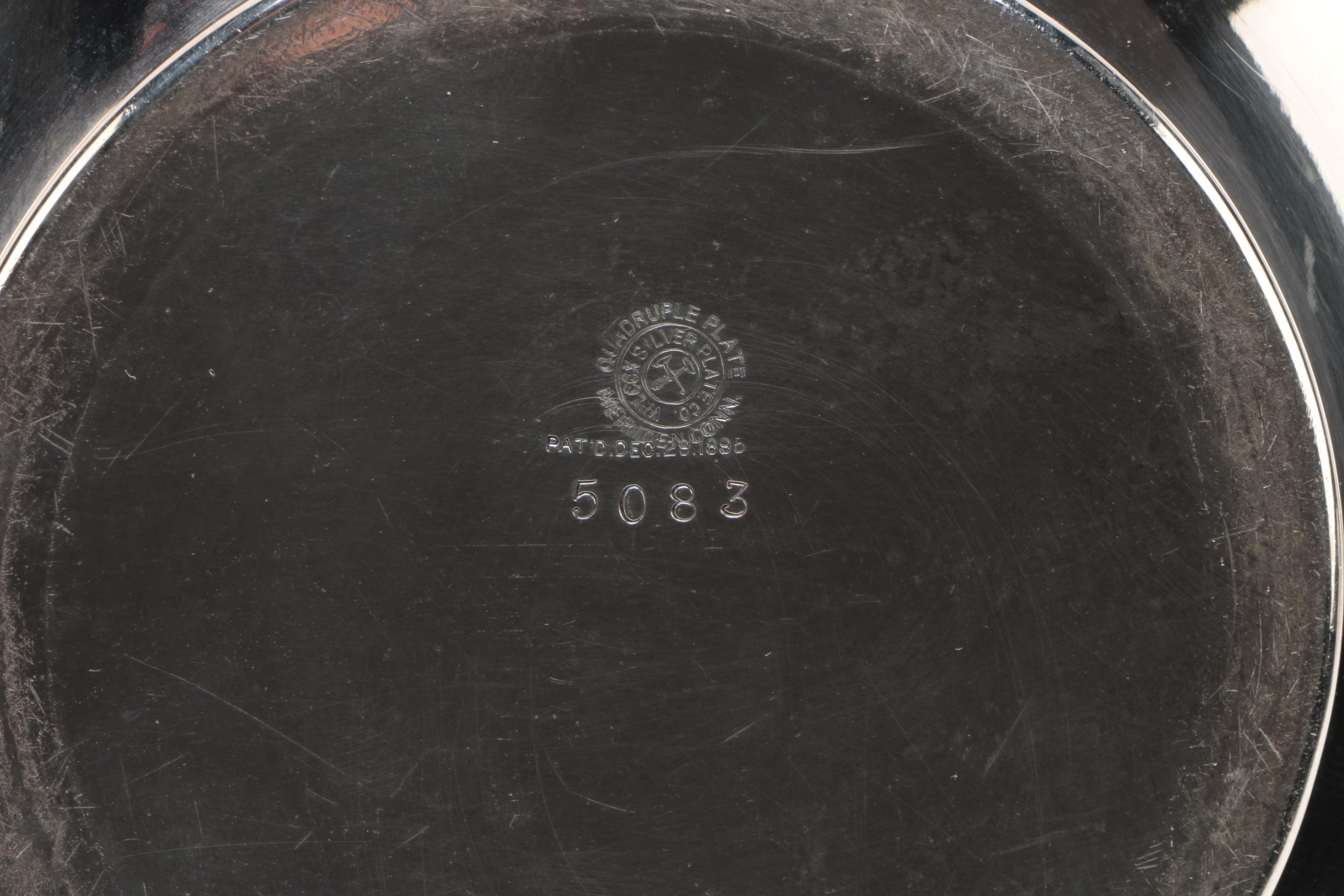 Wilcox Silver Plate Co. Repoussé Teapot with Warming Tilt Stand