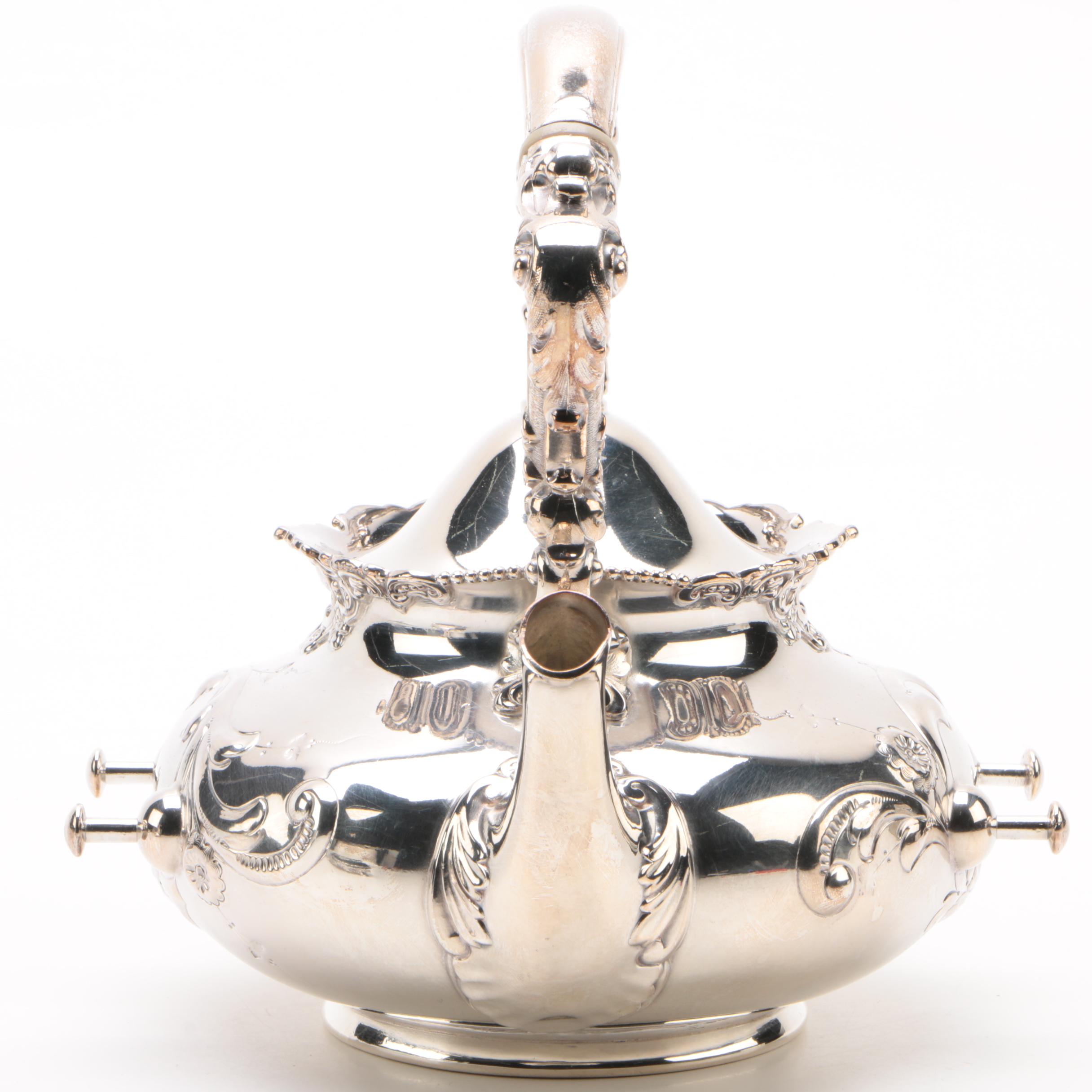 Wilcox Silver Plate Co. Repoussé Teapot with Warming Tilt Stand
