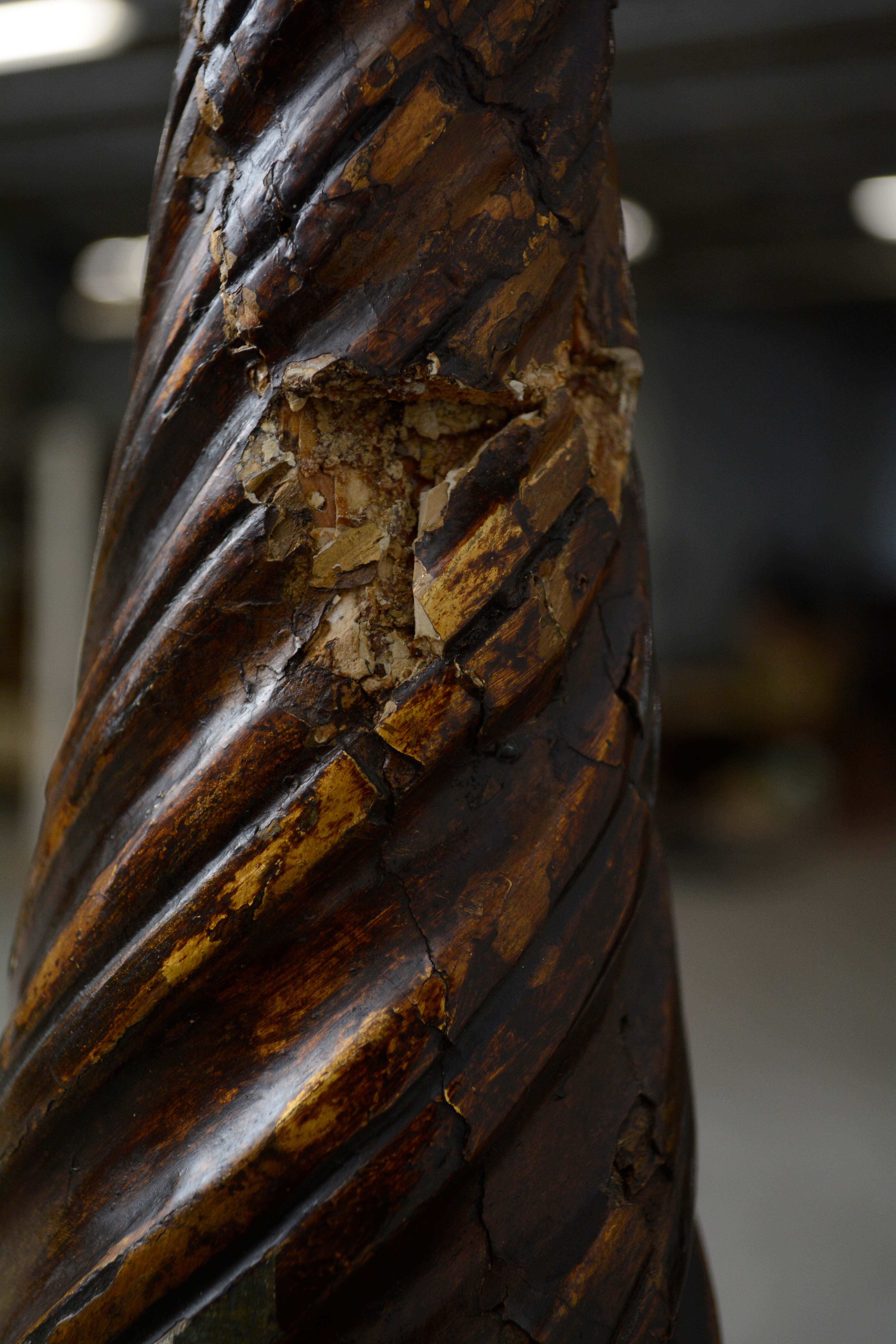 Ornately Carved Wooden Light Standards Featuring Heraldic Panels and Paw Feet
