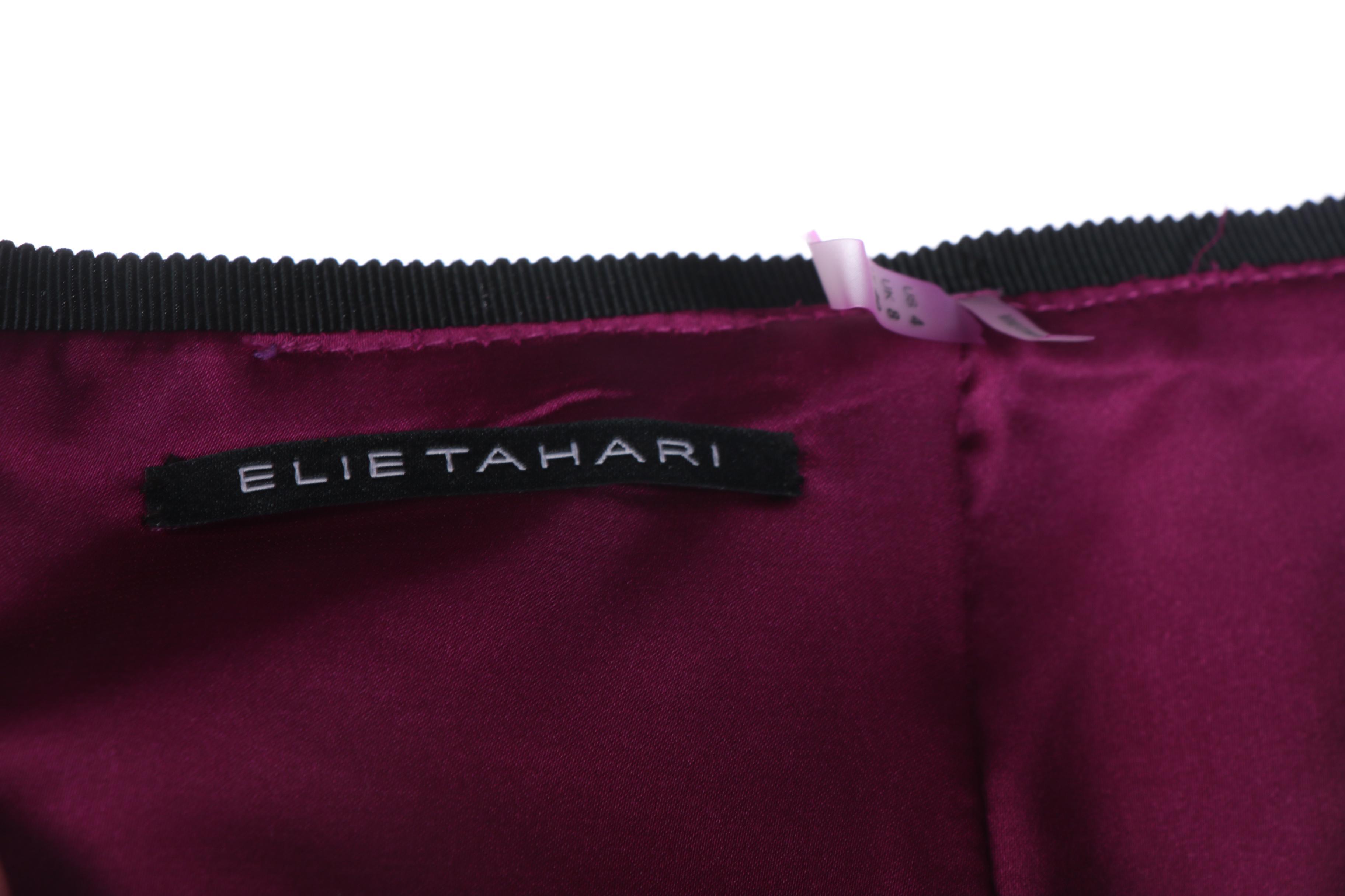 Elie Tahari Leather Accented Jacket, Dark Tone Blazers and Magenta Skirt Suit