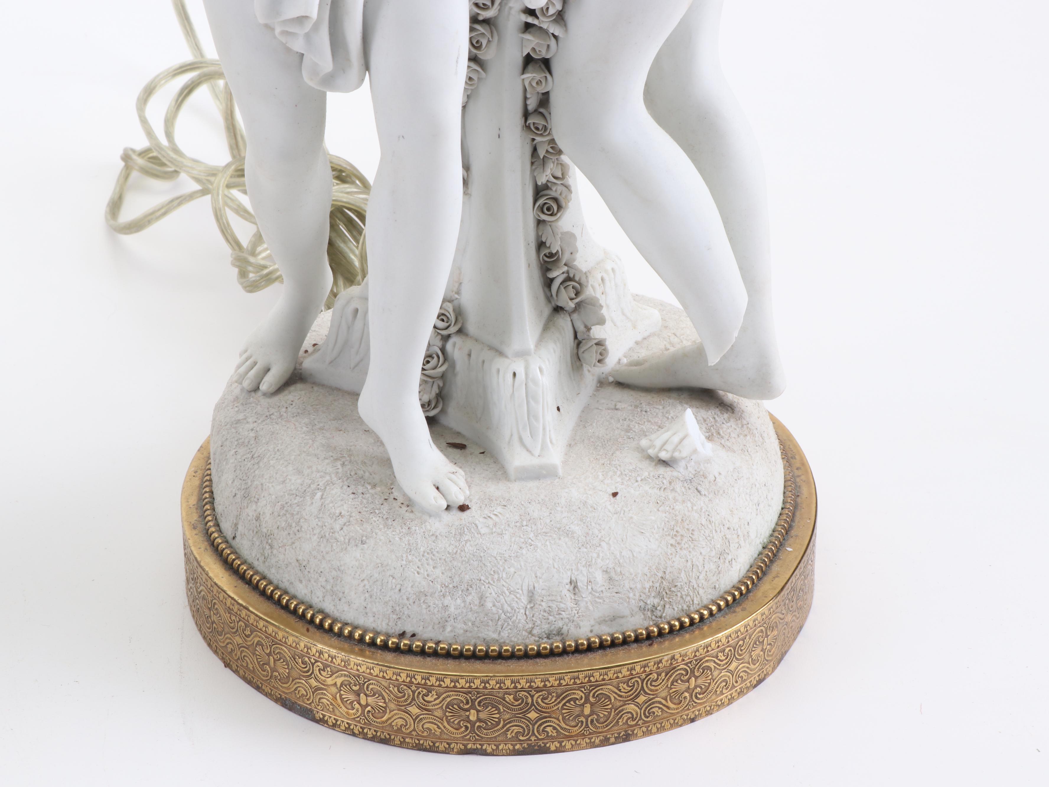 Neoclassical Bisque Porcelain Figural and Gilded Metal Candelabra Table Lamps