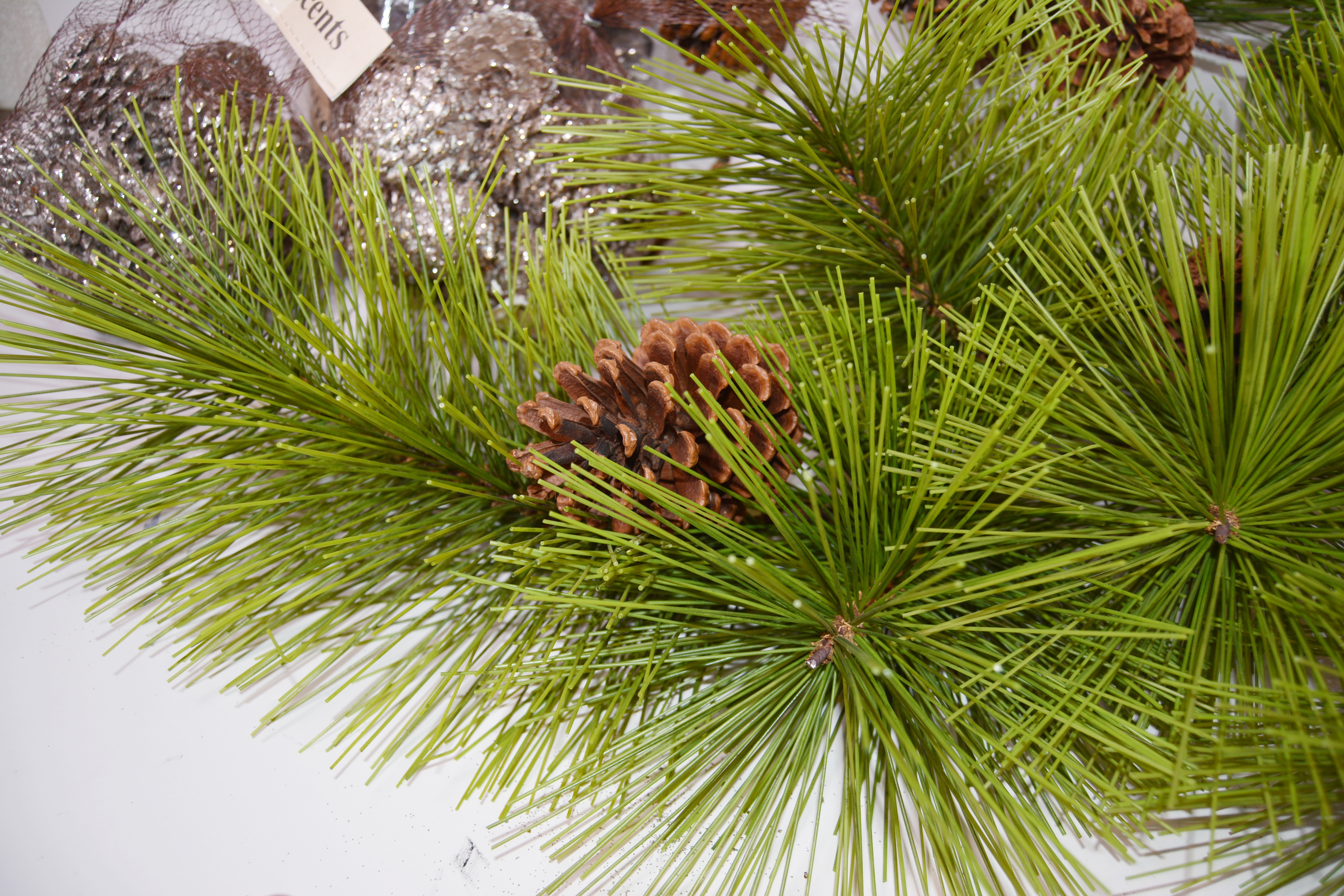 Collection of Decorative Pine Cones and Faux Branches