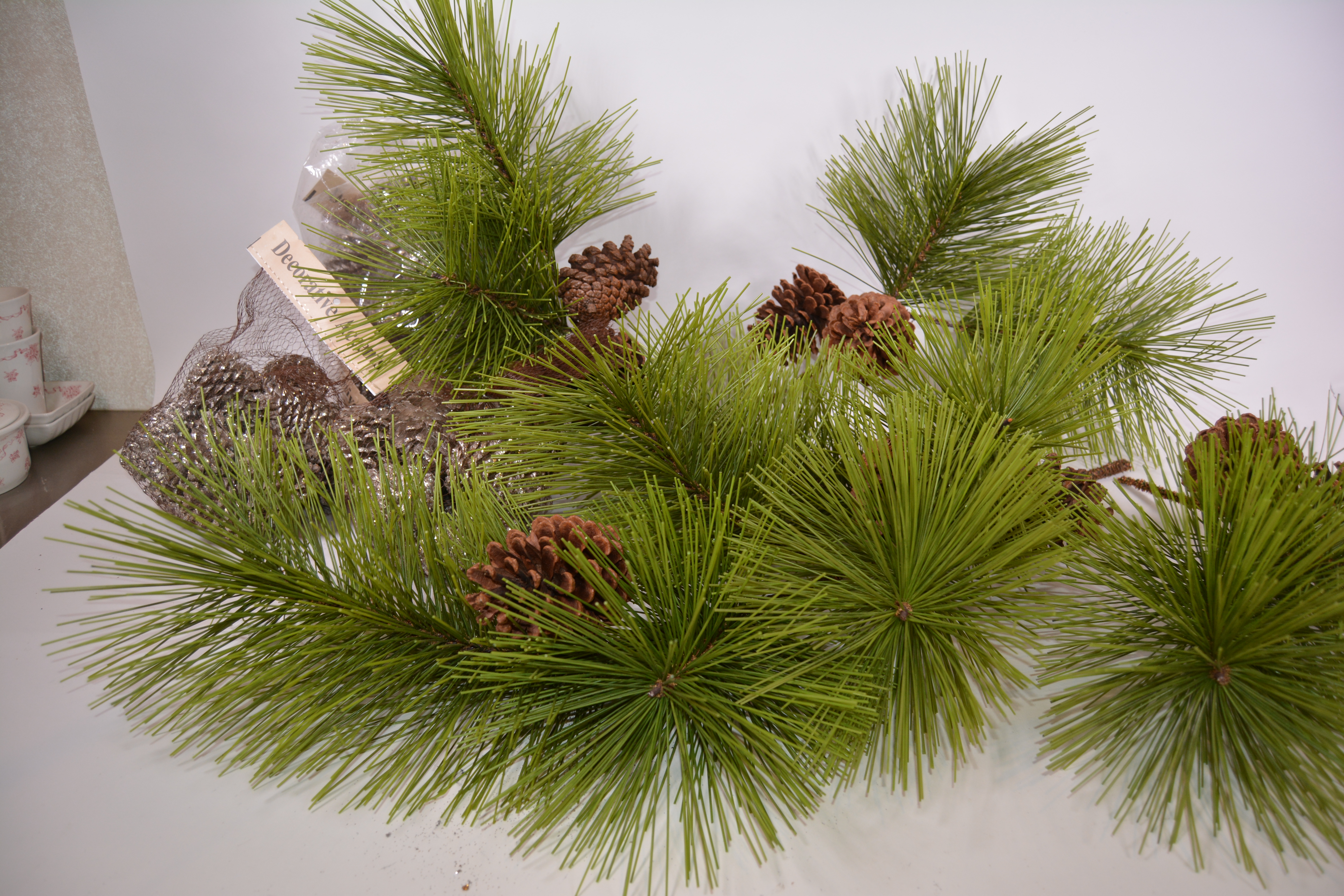 Collection of Decorative Pine Cones and Faux Branches