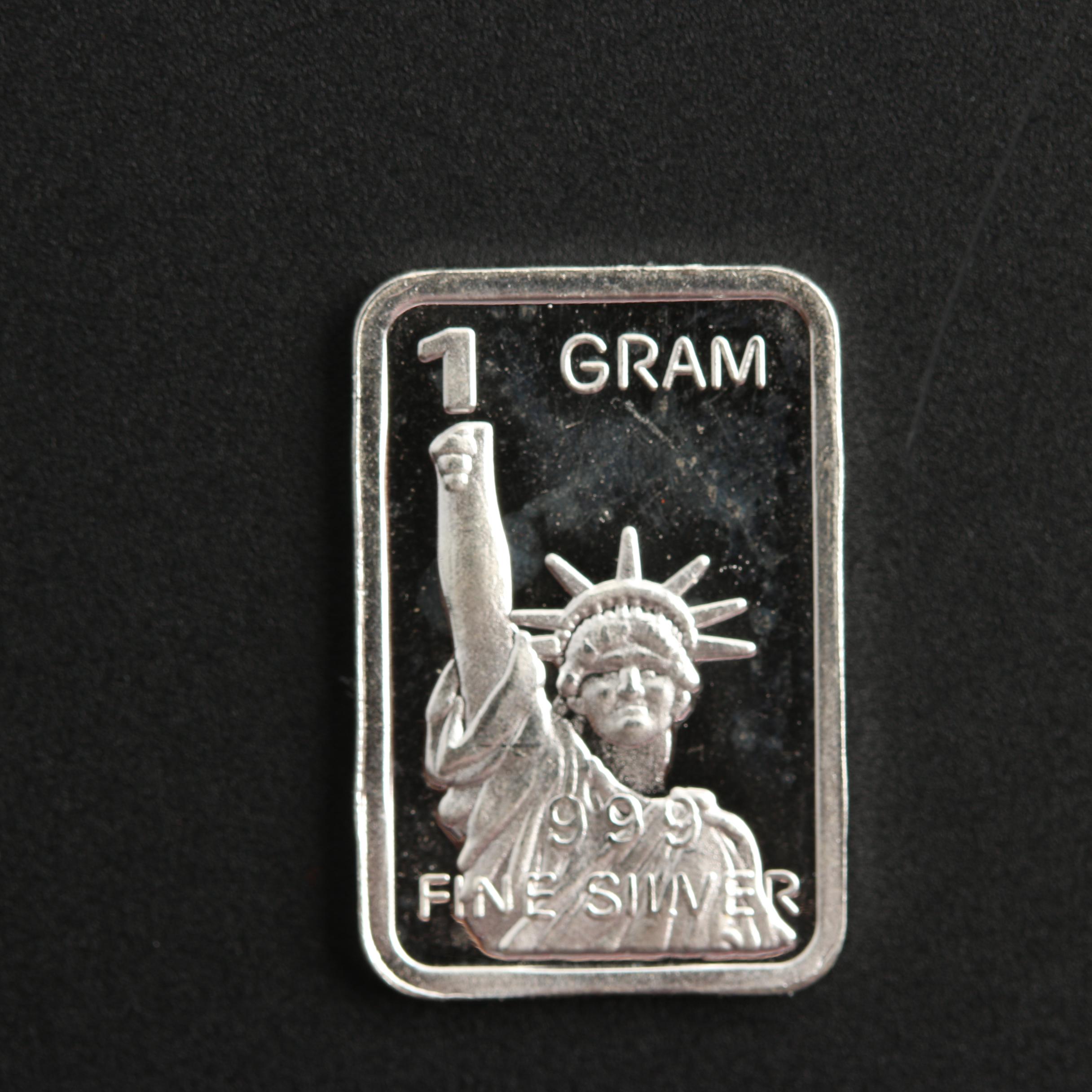 Group of Ten One Gram Silver Ingots Depicting The Statue of Liberty