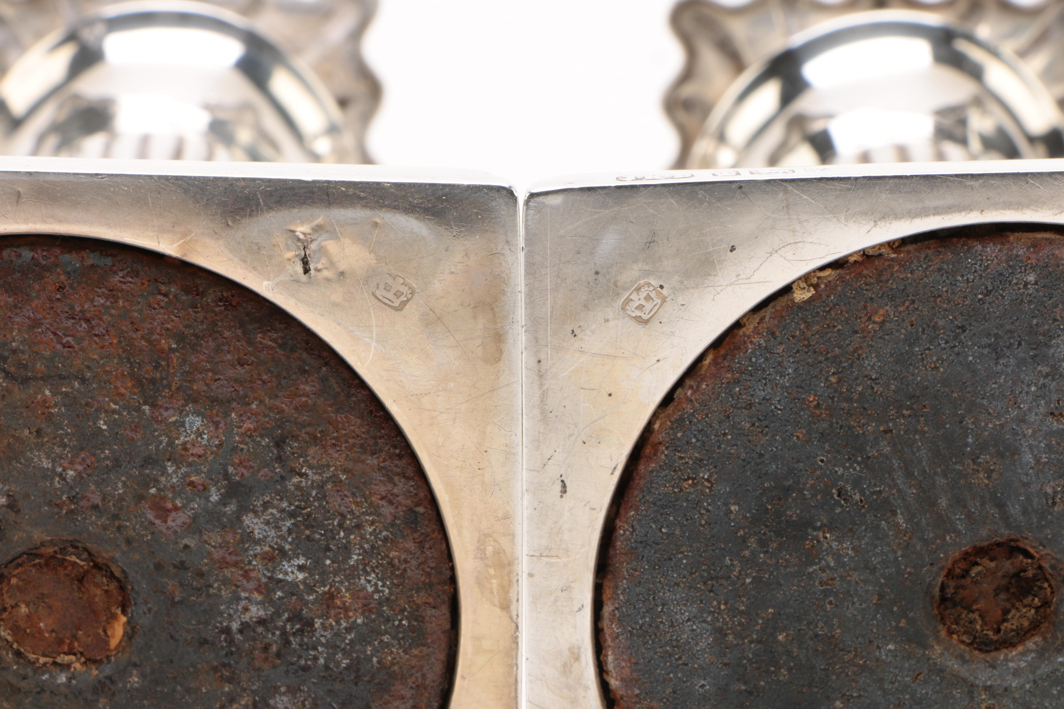 Hawksworth, Eyre & Co. Weighted Sterling Silver Candlesticks, Late 19th Century