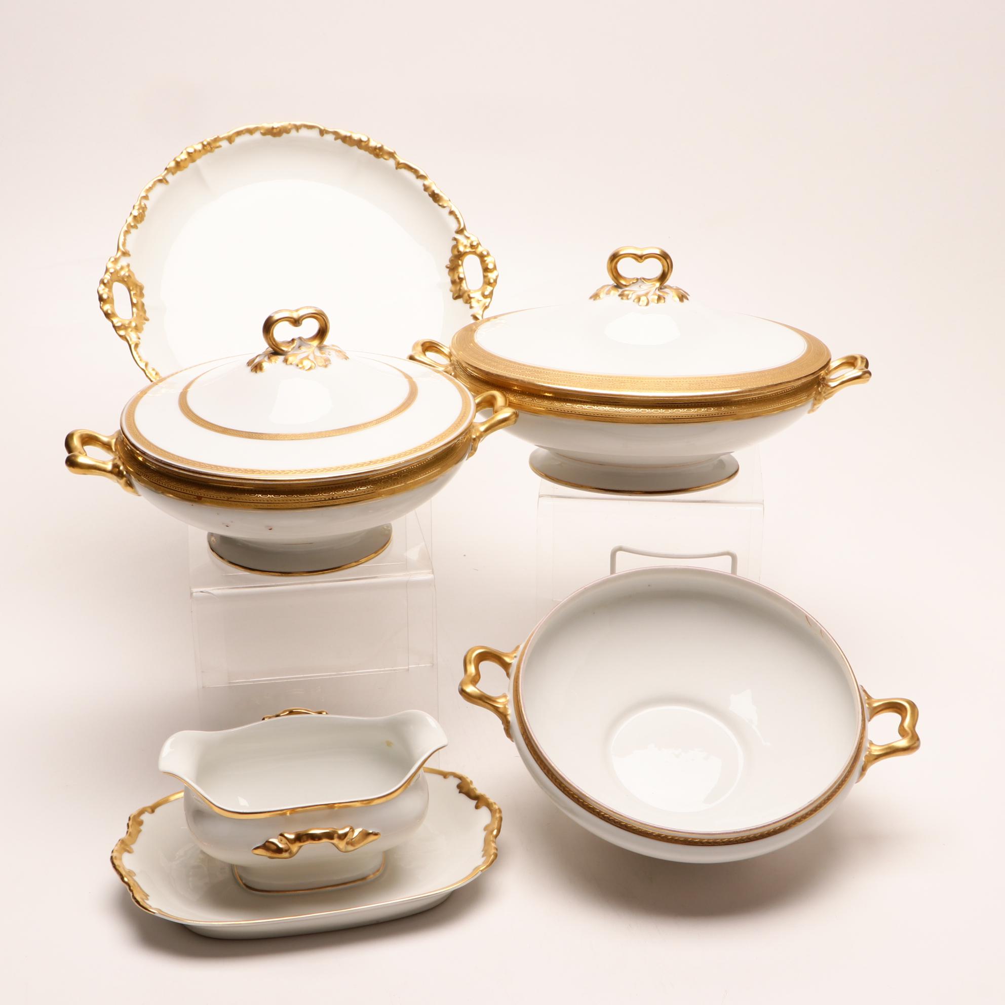 Assorted Gold and White Dinnerware Featuring Limoges and Royal Worcester