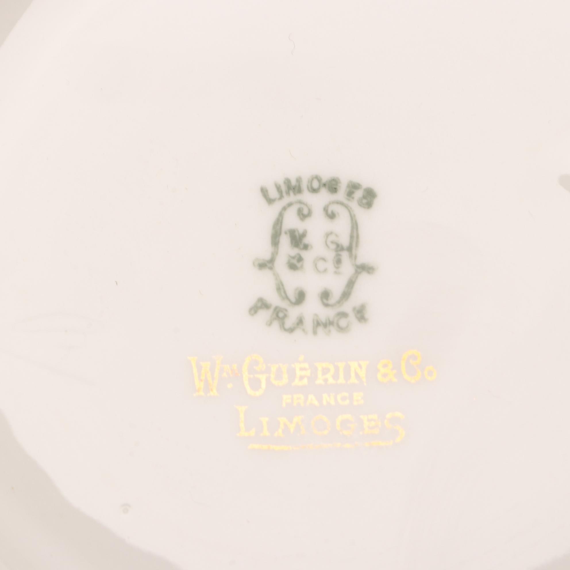 Assorted Gold and White Dinnerware Featuring Limoges and Royal Worcester