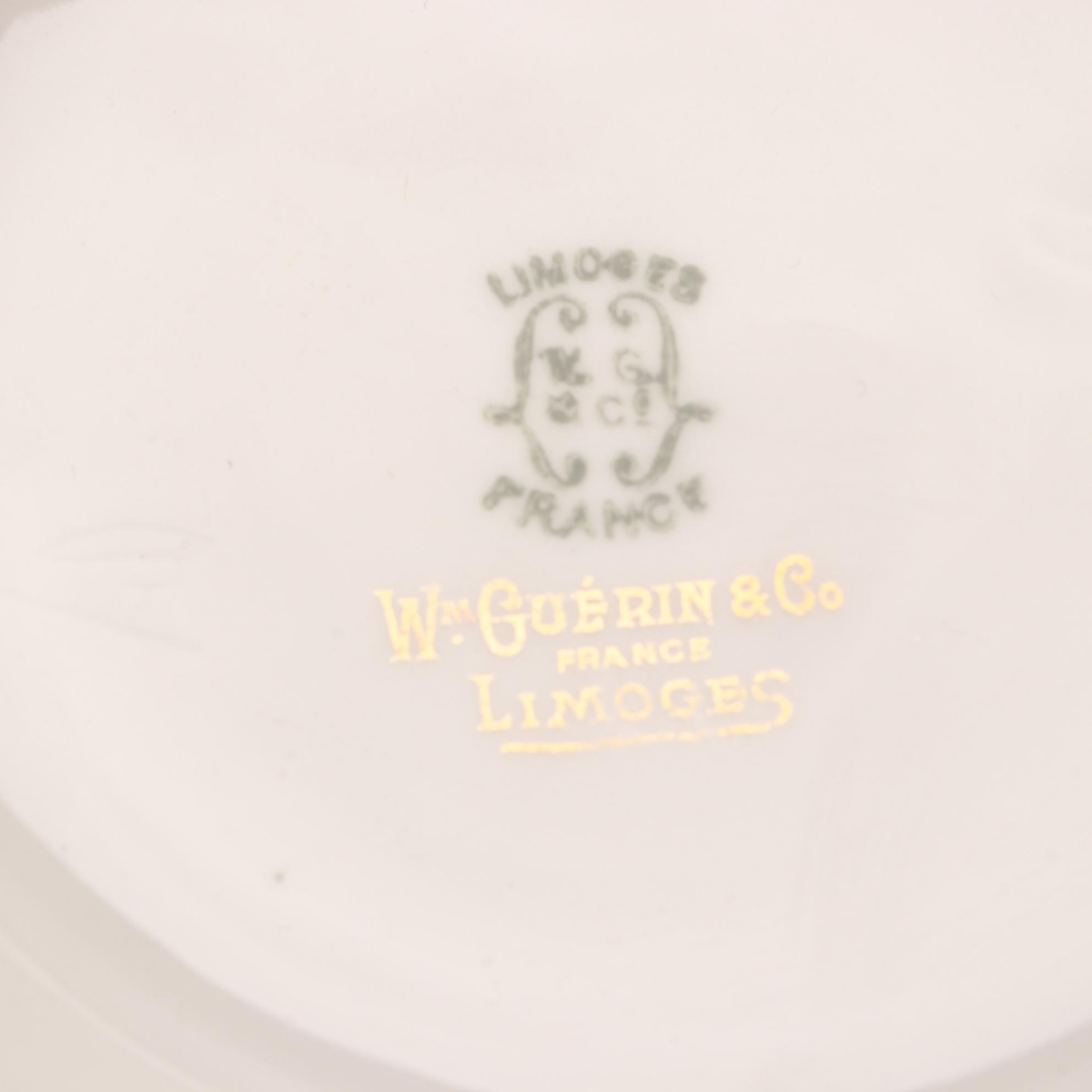 Assorted Gold and White Dinnerware Featuring Limoges and Royal Worcester