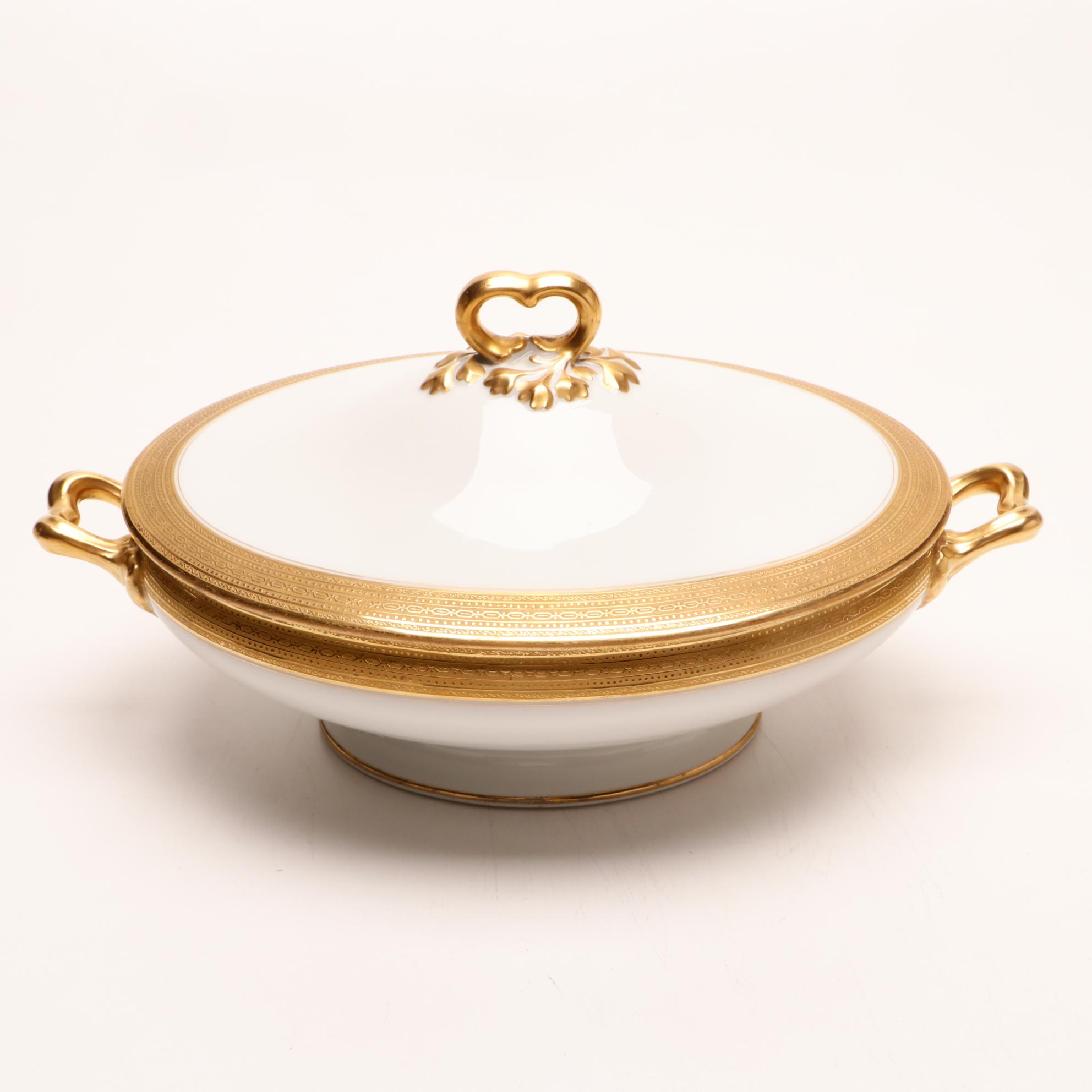 Assorted Gold and White Dinnerware Featuring Limoges and Royal Worcester