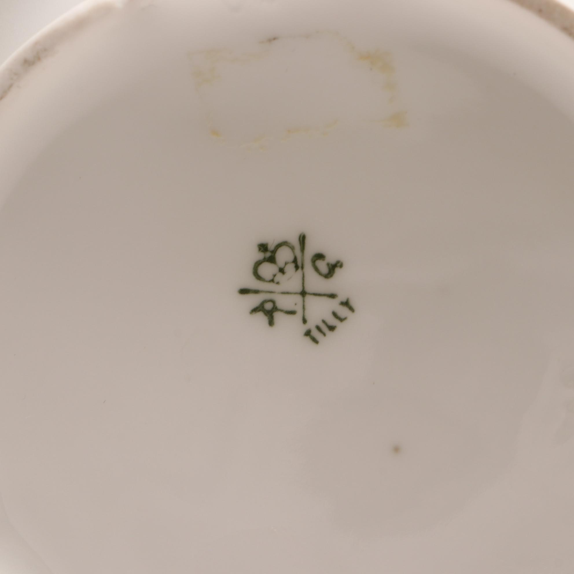 Assorted Gold and White Dinnerware Featuring Limoges and Royal Worcester