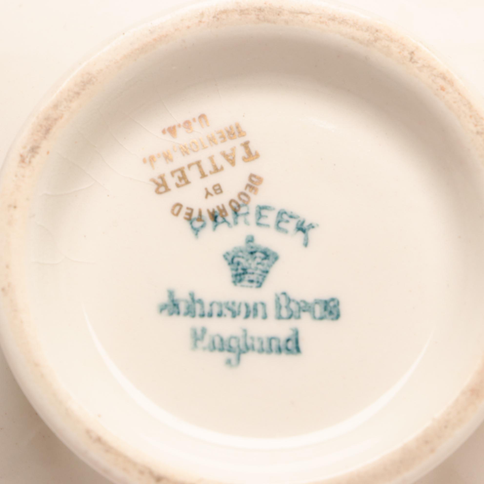 Assorted Gold and White Dinnerware Featuring Limoges and Royal Worcester