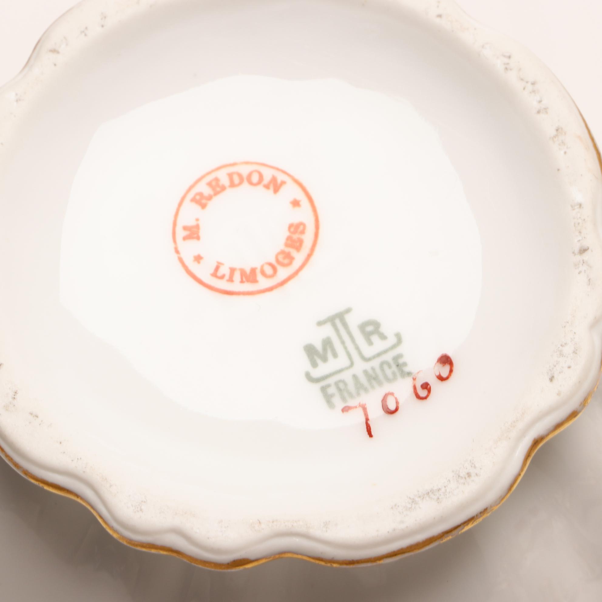 Assorted Gold and White Dinnerware Featuring Limoges and Royal Worcester